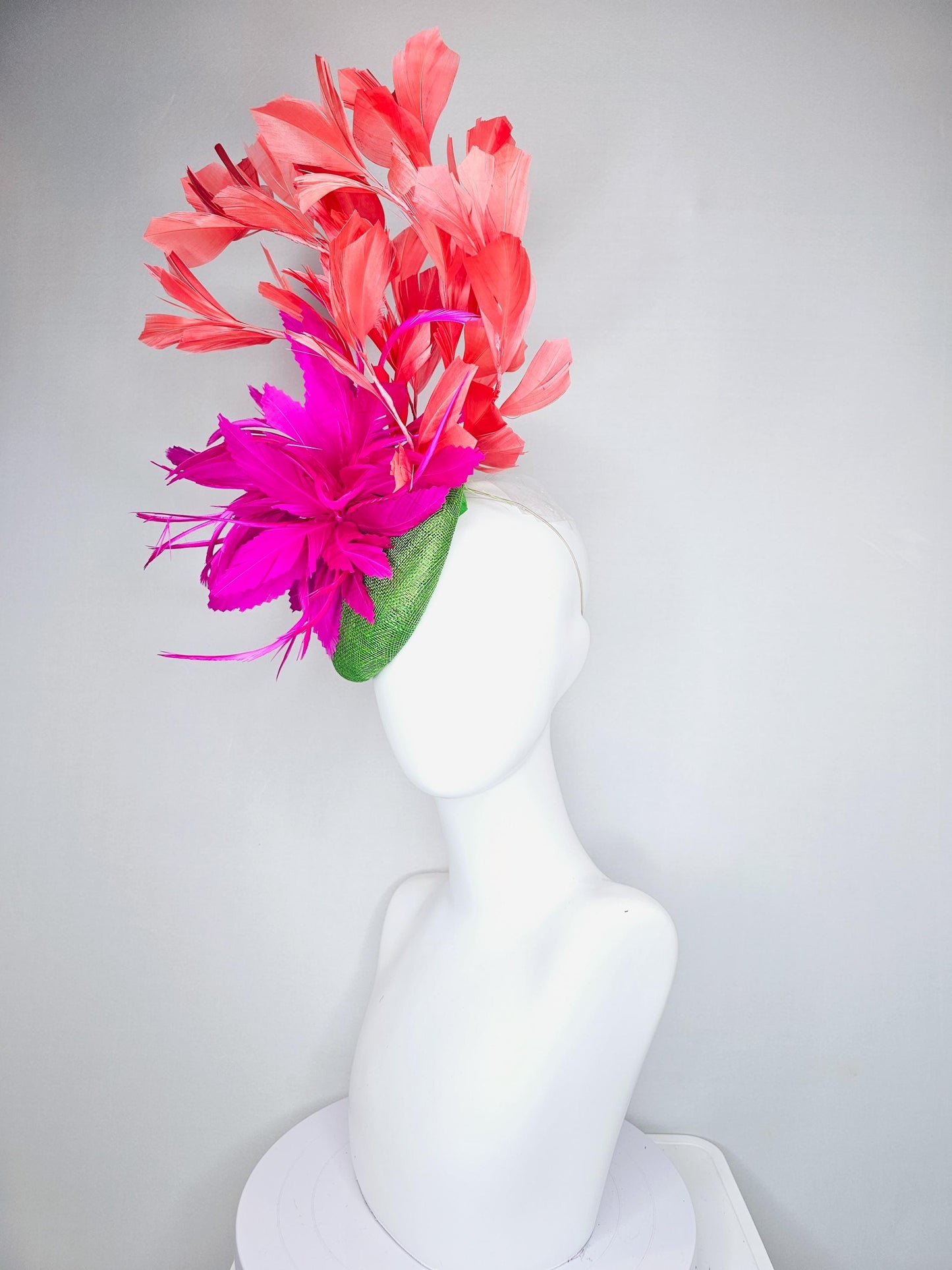 kentucky derby hat fascinator lime green sinamay base with bright pink fuchsia zigzag feather flowers, coral orange branching feathers