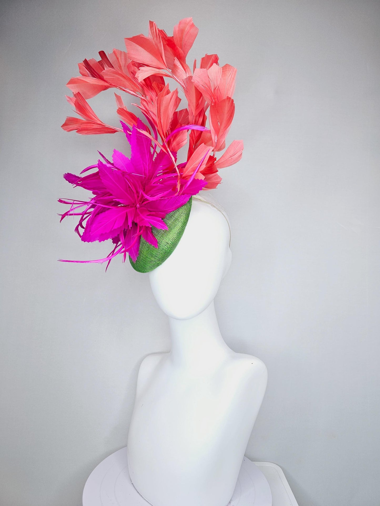 kentucky derby hat fascinator lime green sinamay base with bright pink fuchsia zigzag feather flowers, coral orange branching feathers