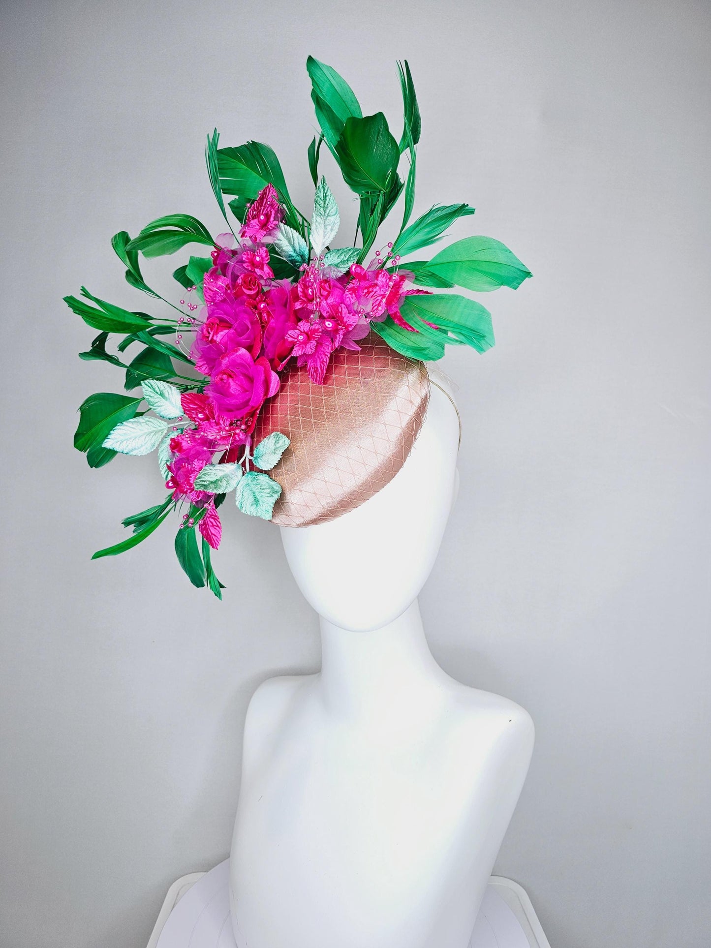 kentucky derby hat fascinator champagne satin w/ netting, bright pink fuchsia organza satin flowers,mint green leaves,emerald green feathers