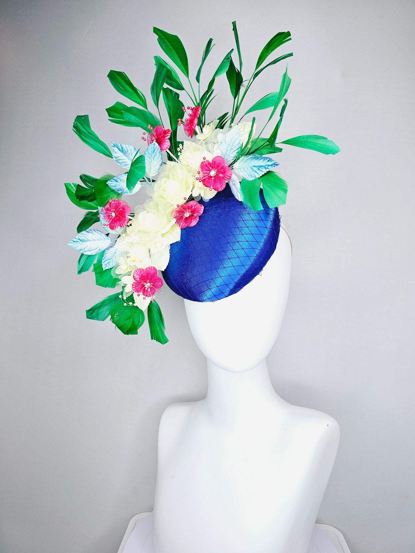 kentucky derby hat fascinator royal blue satin w/ netting, light yellow pink organza satin flowers, ombre blue leaves,emerald green feathers