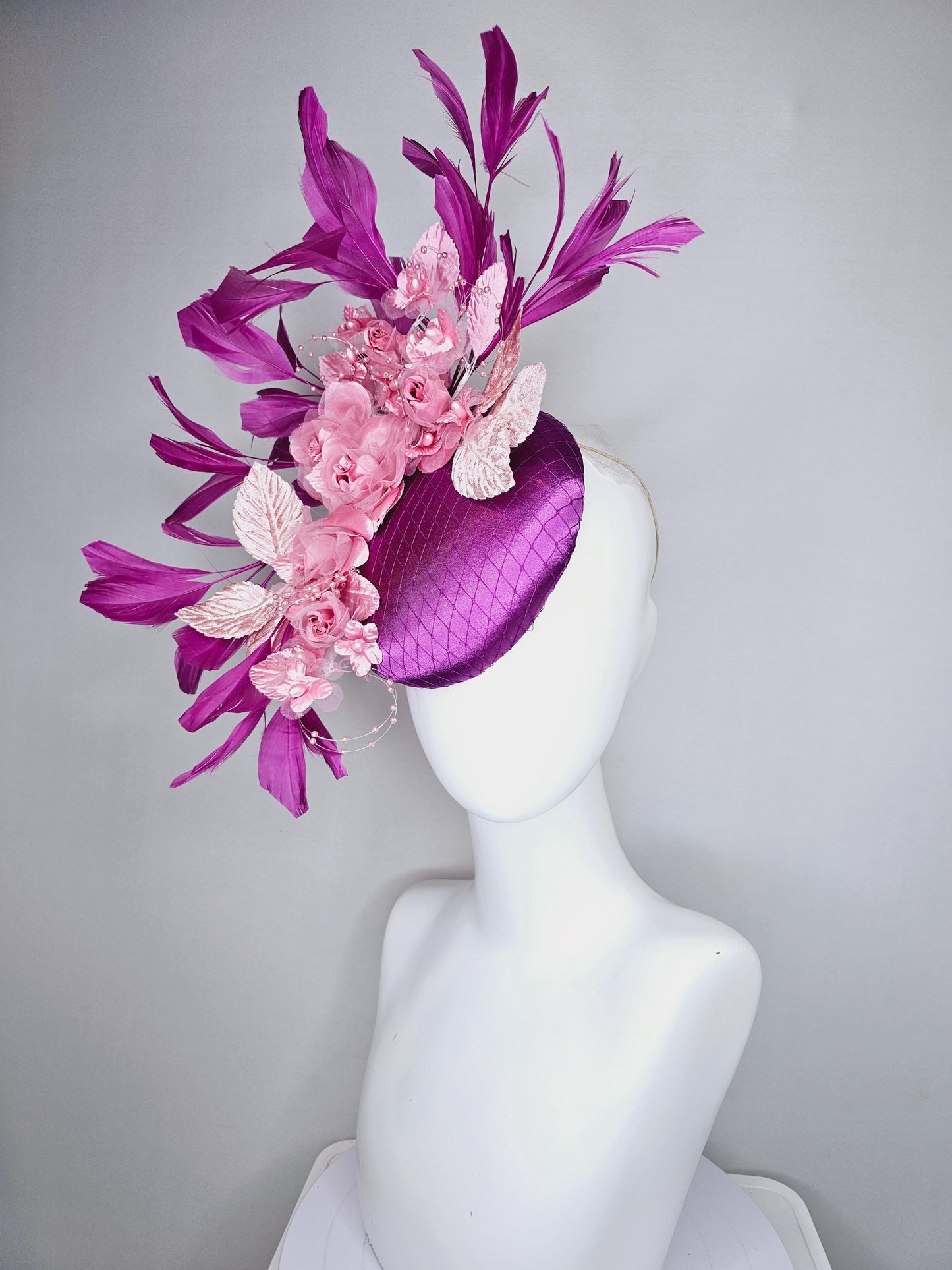 kentucky derby hat fascinator purple satin with netting, light blush pink organza satin flowers, light pink leaves, magenta purple feathers