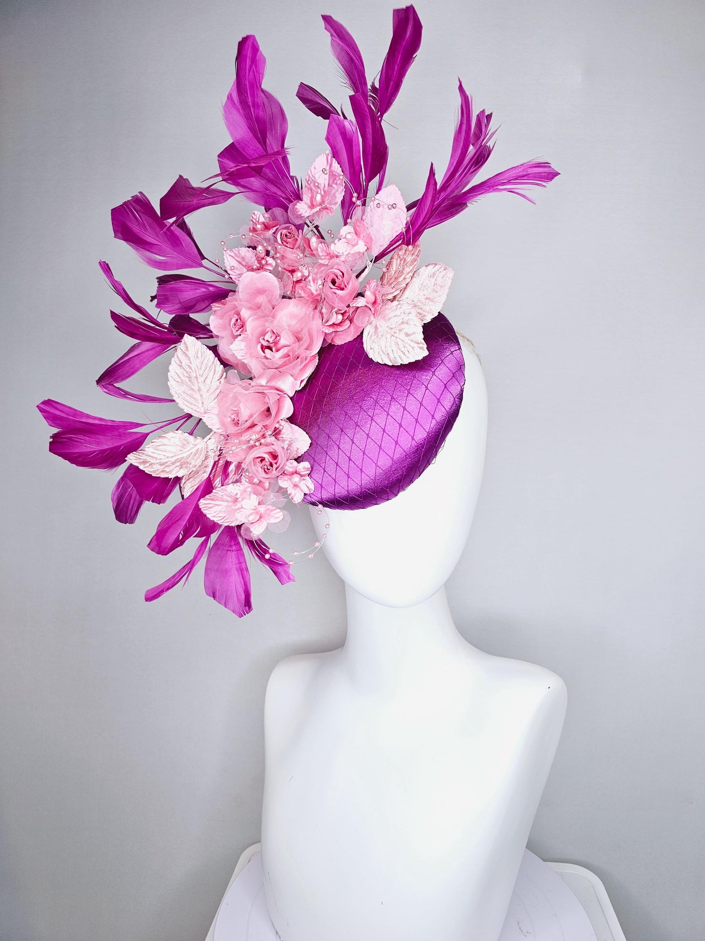 kentucky derby hat fascinator purple satin with netting, light blush pink organza satin flowers, light pink leaves, magenta purple feathers