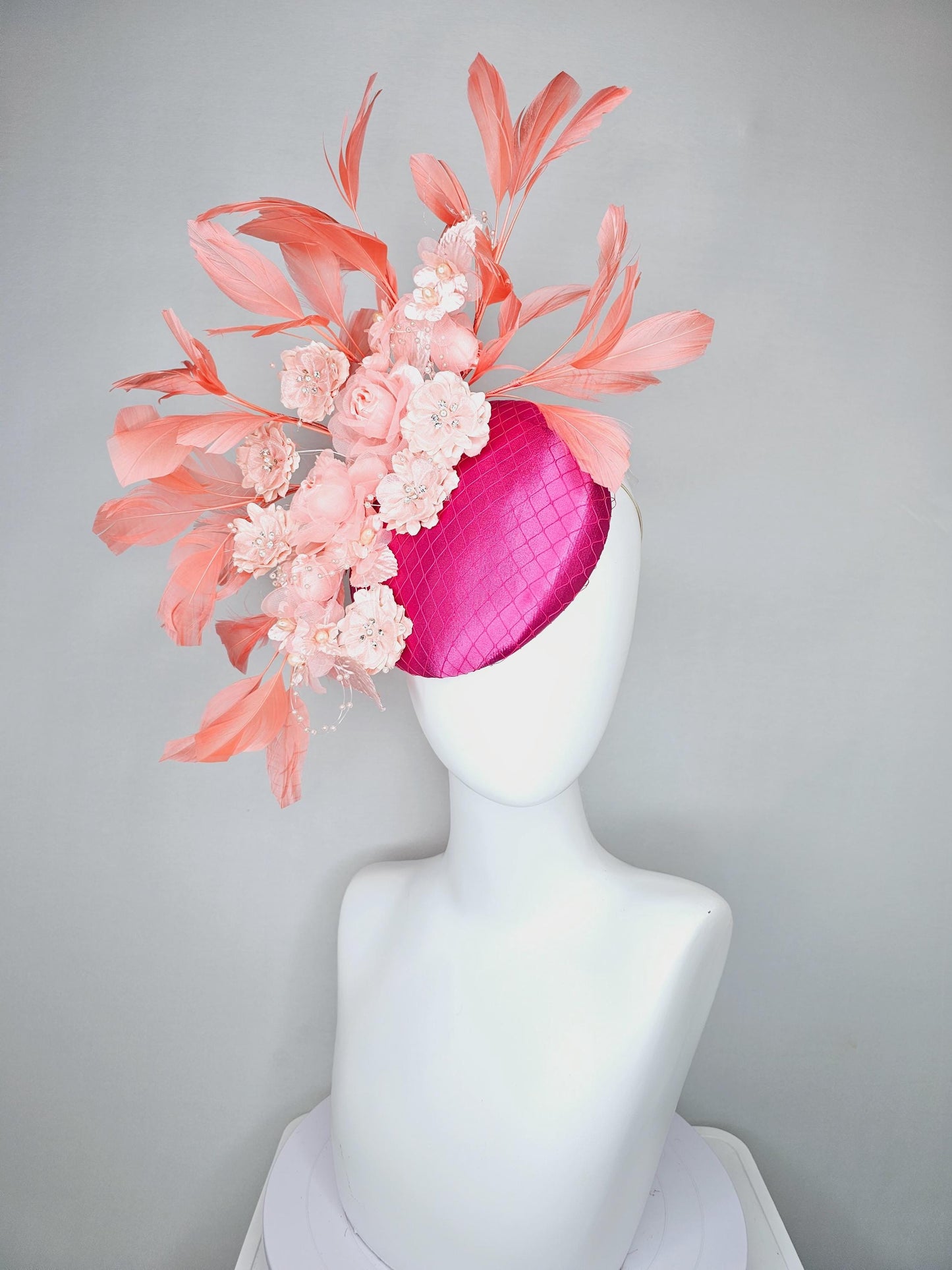 kentucky derby hat fascinator bright pink satin with netting, light blush pink organza satin flowers,light pink leaves,coral orange feathers