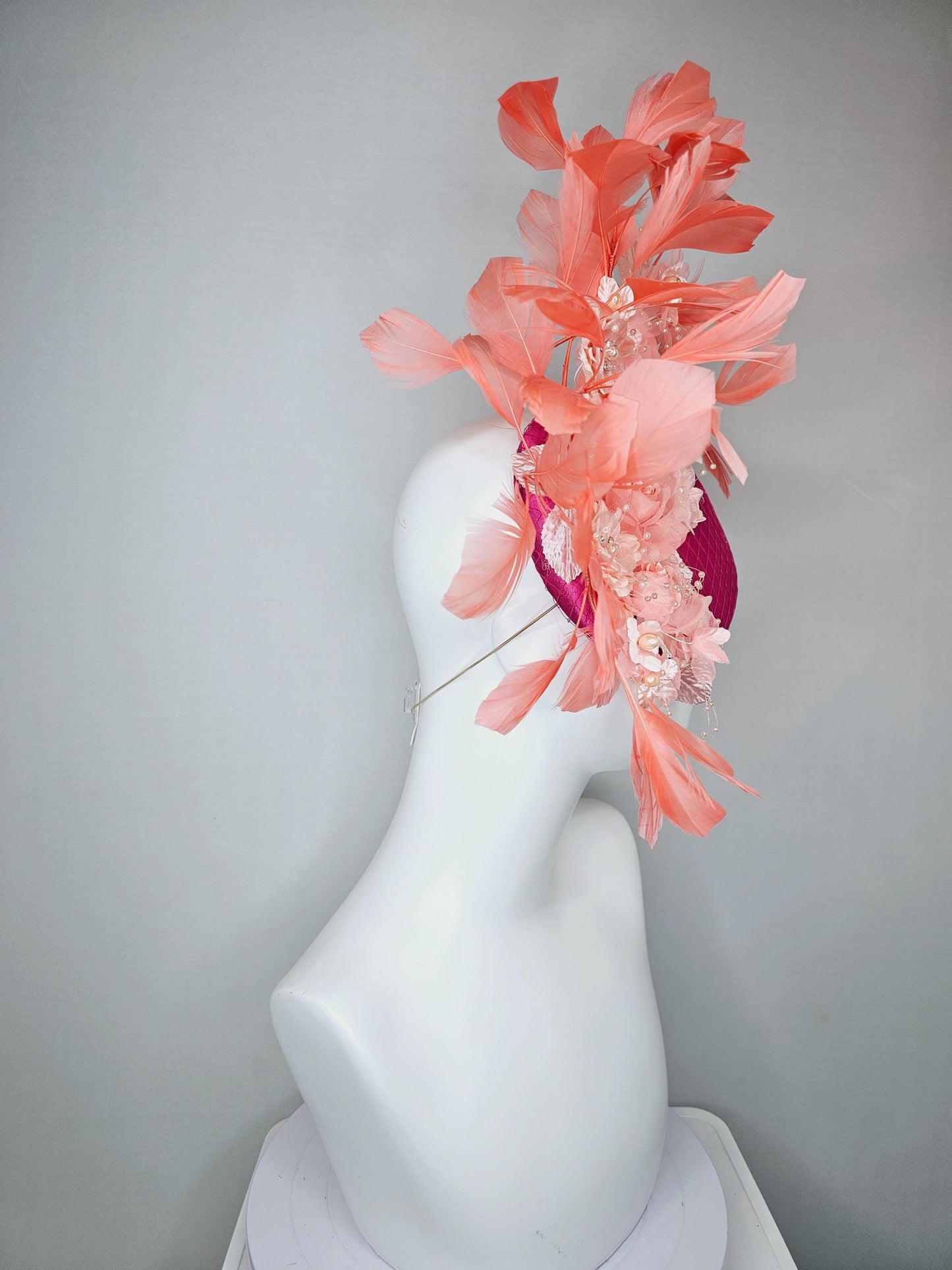 kentucky derby hat fascinator bright pink satin with netting, light blush pink organza satin flowers,light pink leaves,coral orange feathers