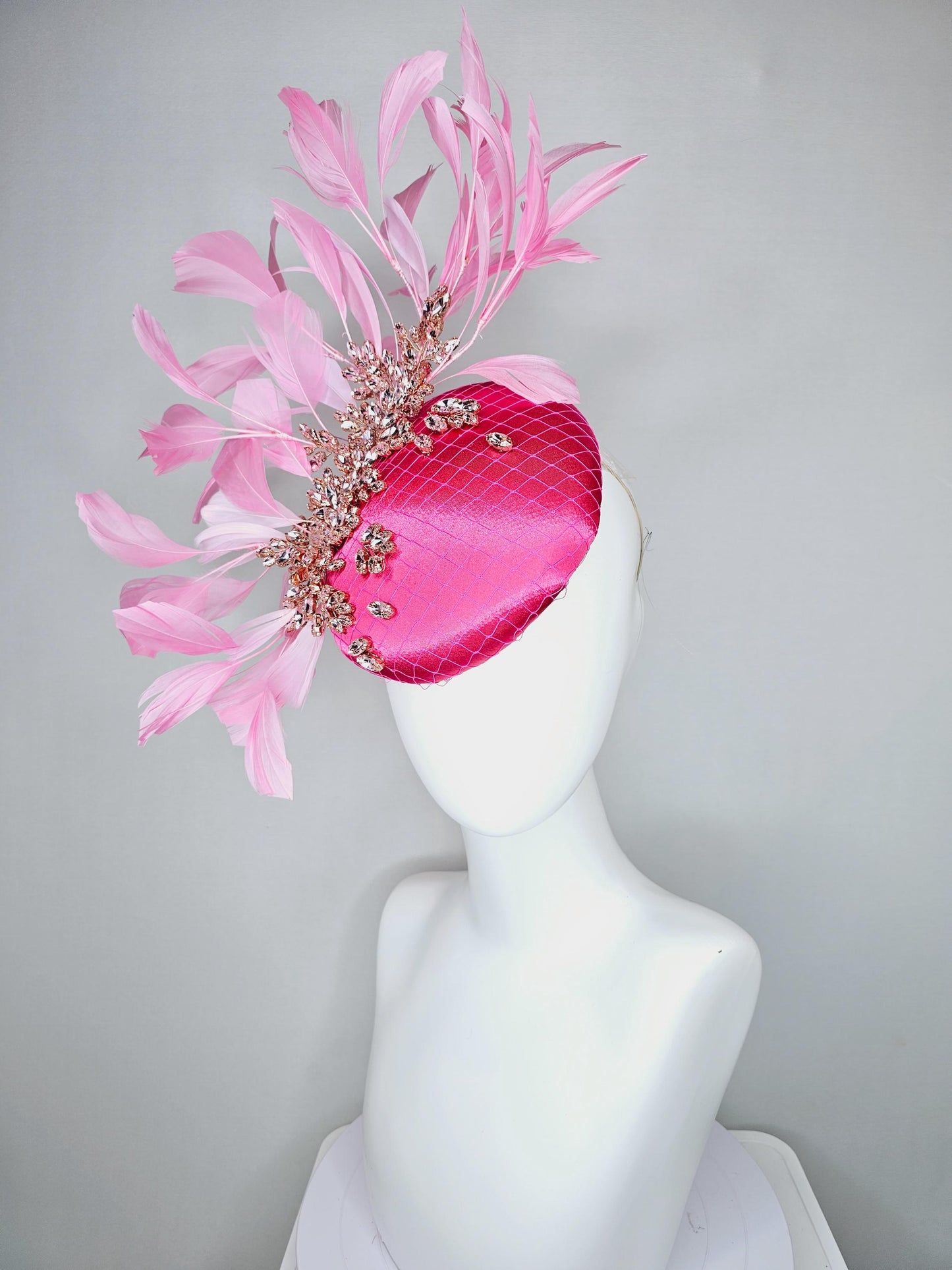 kentucky derby hat fascinator hot pink satin with netting and light pink crystal beaded jewels stems, light blush pink branching feathers