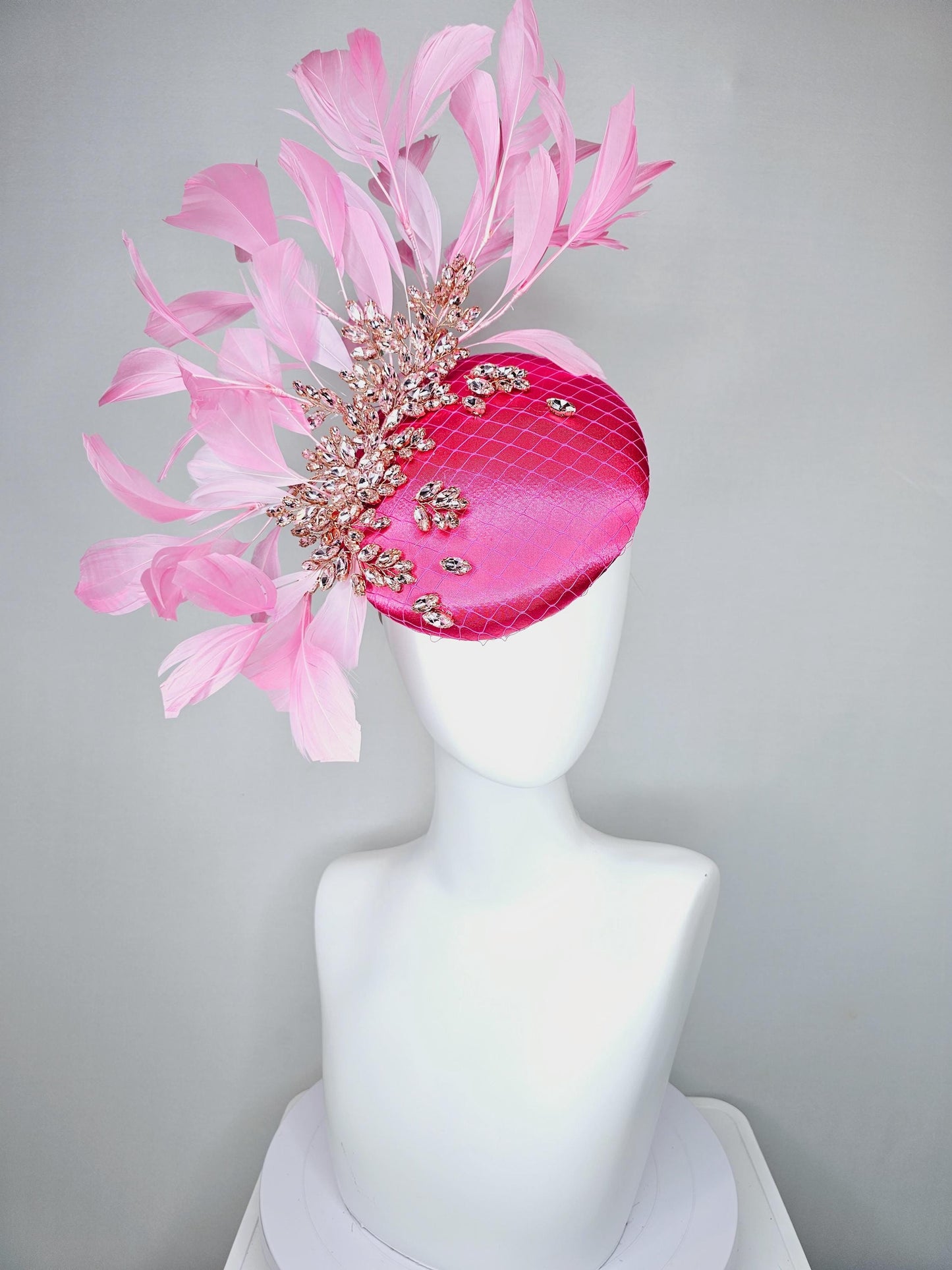 kentucky derby hat fascinator hot pink satin with netting and light pink crystal beaded jewels stems, light blush pink branching feathers