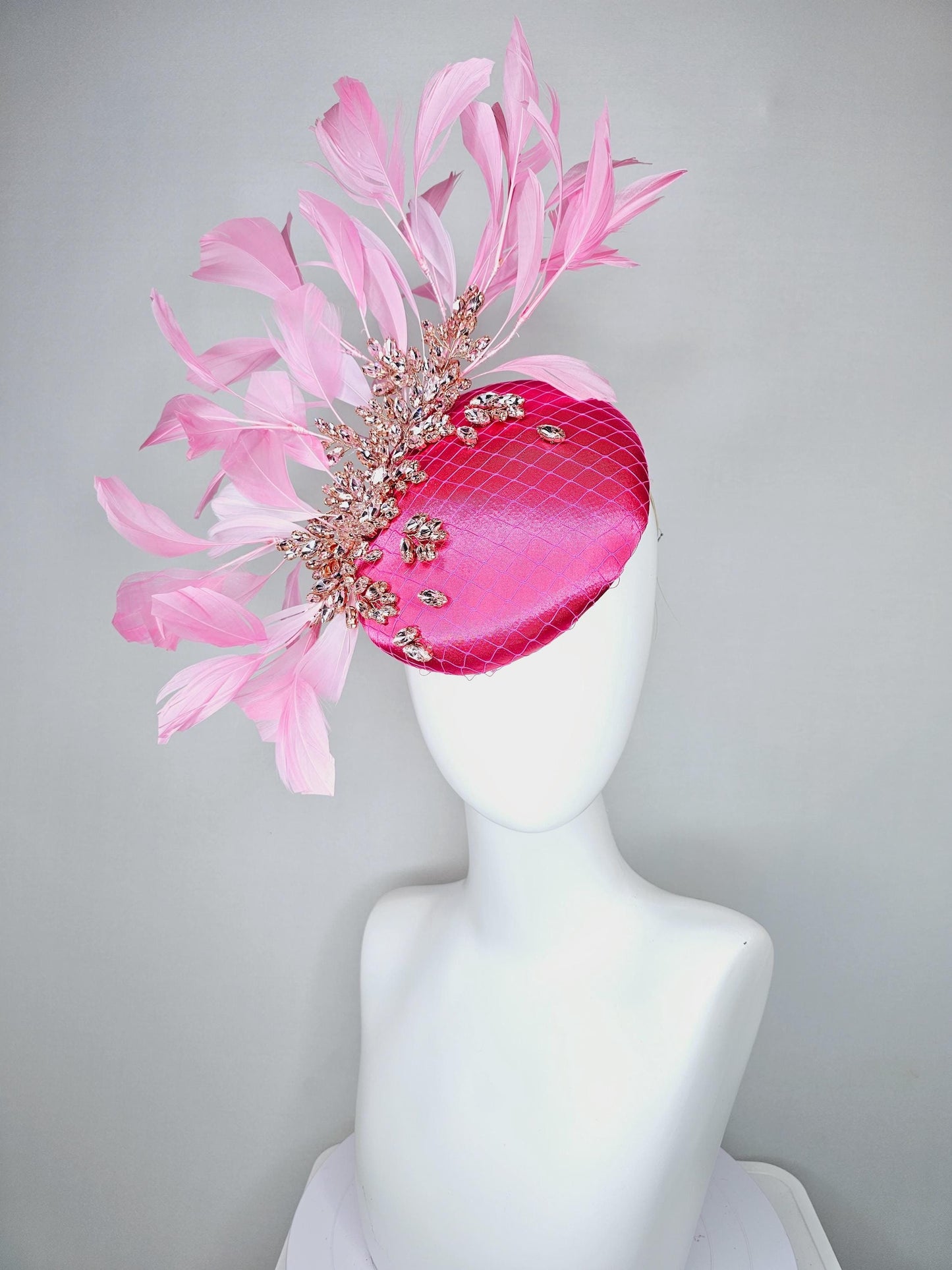 kentucky derby hat fascinator hot pink satin with netting and light pink crystal beaded jewels stems, light blush pink branching feathers