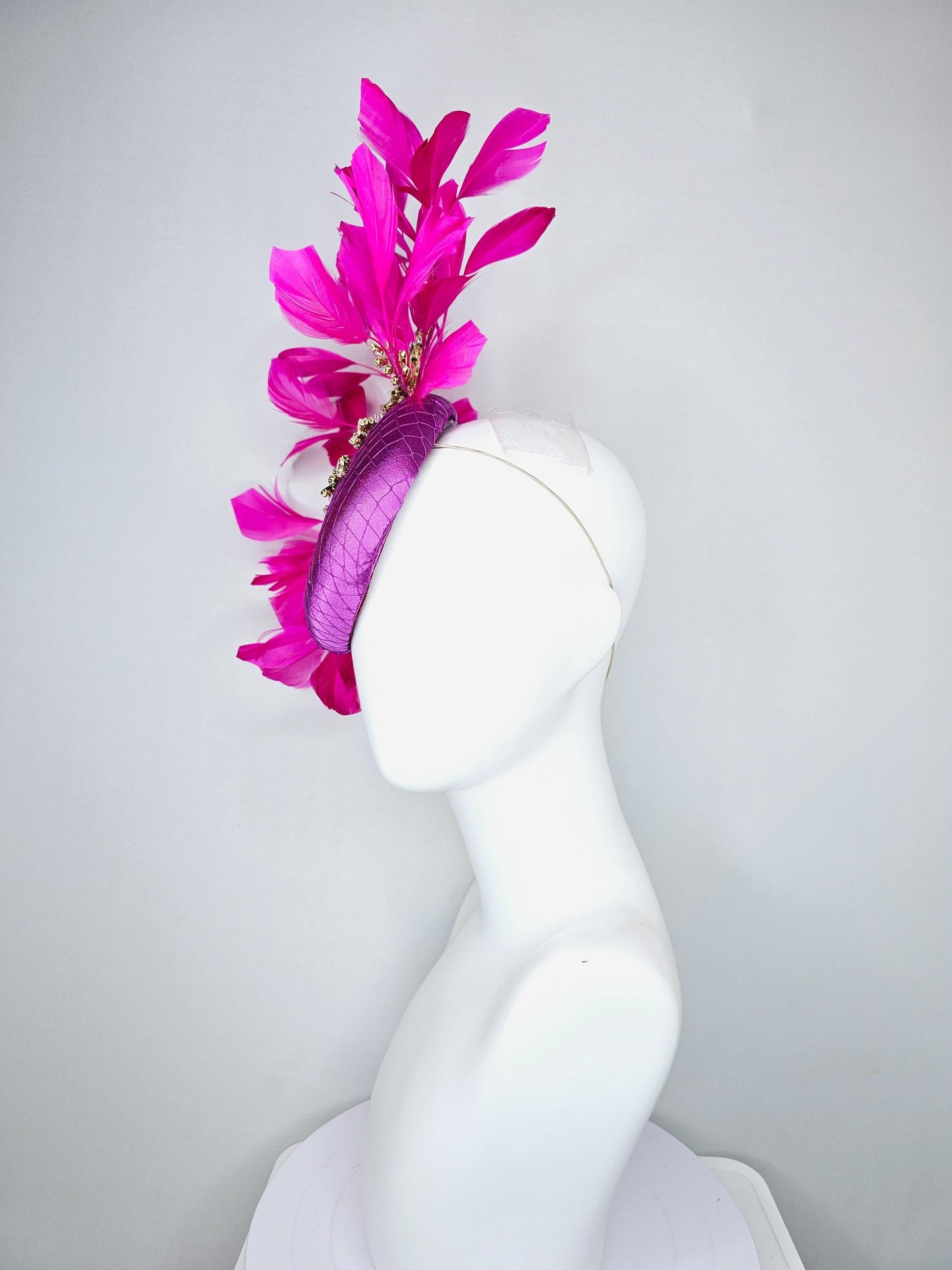 kentucky derby hat fascinator purple satin with netting,green and clear crystal beaded jewels stems,bright pink fuchsia branching feathers