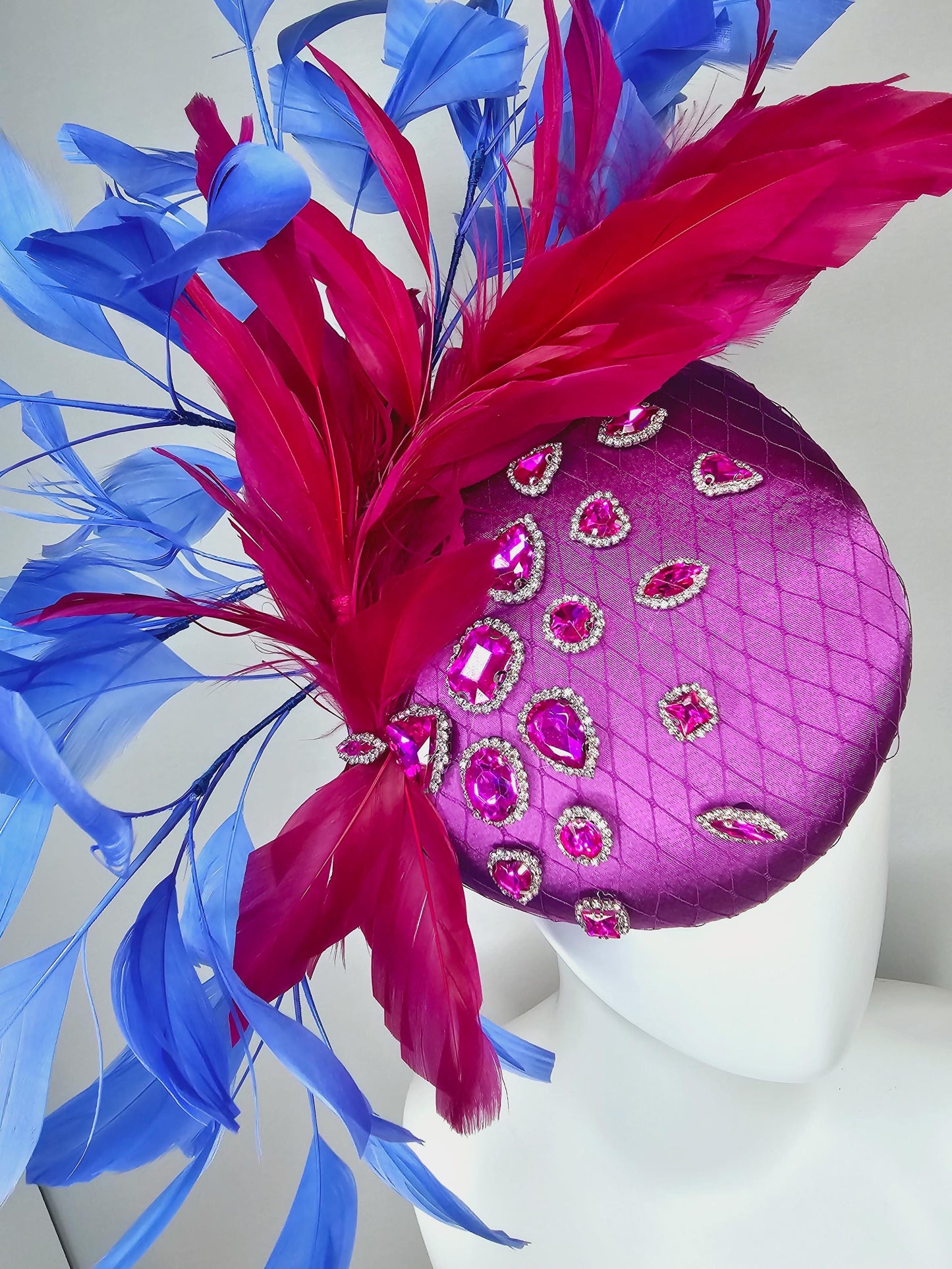 kentucky derby hat fascinator violet purple satin with netting, pink crystal rhinestones jewels, dark pink cobalt blue branching feathers