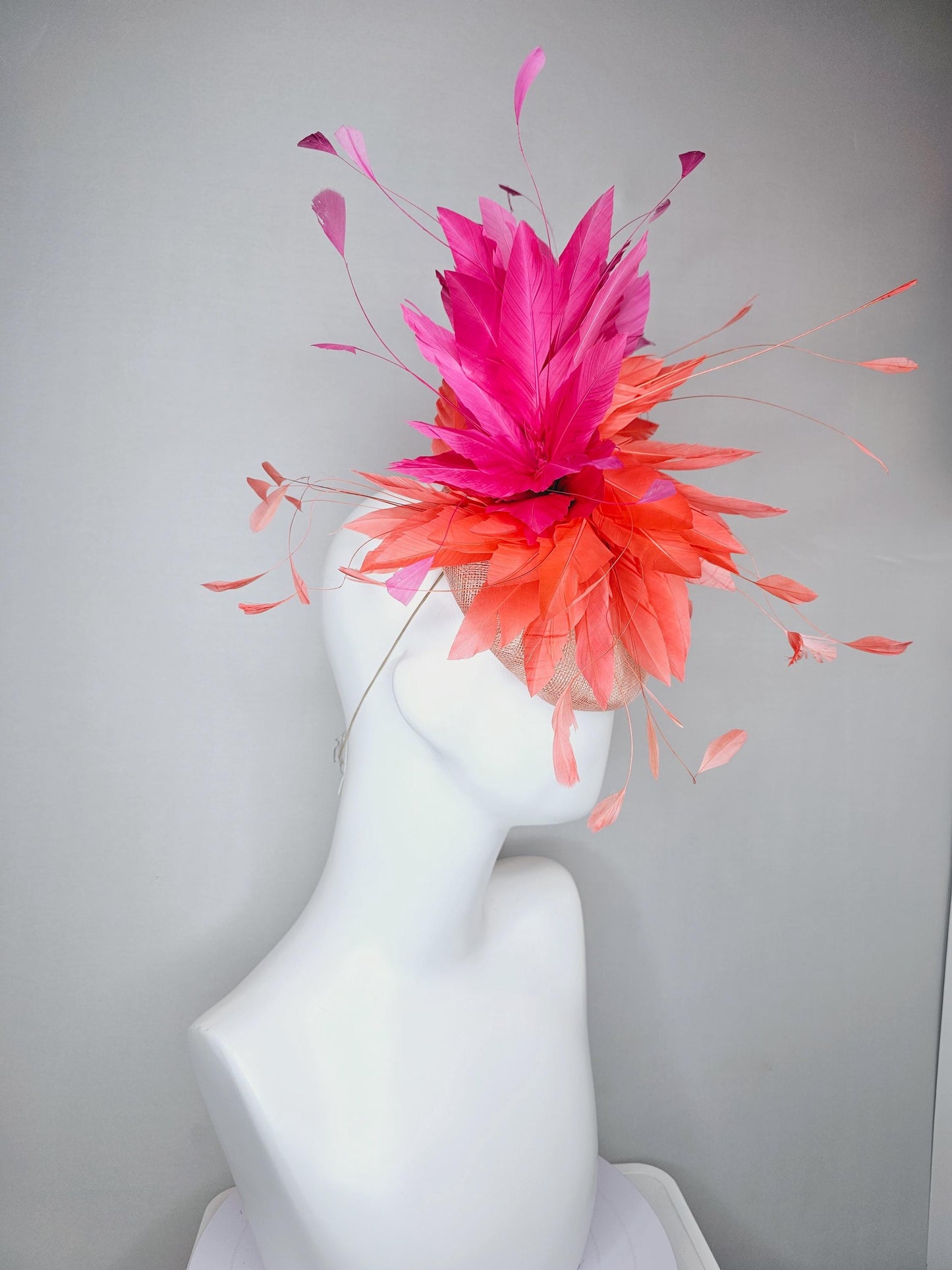 kentucky derby hat fascinator light orange peach sinamay with fluffy coral orange and hot pink branching feathers