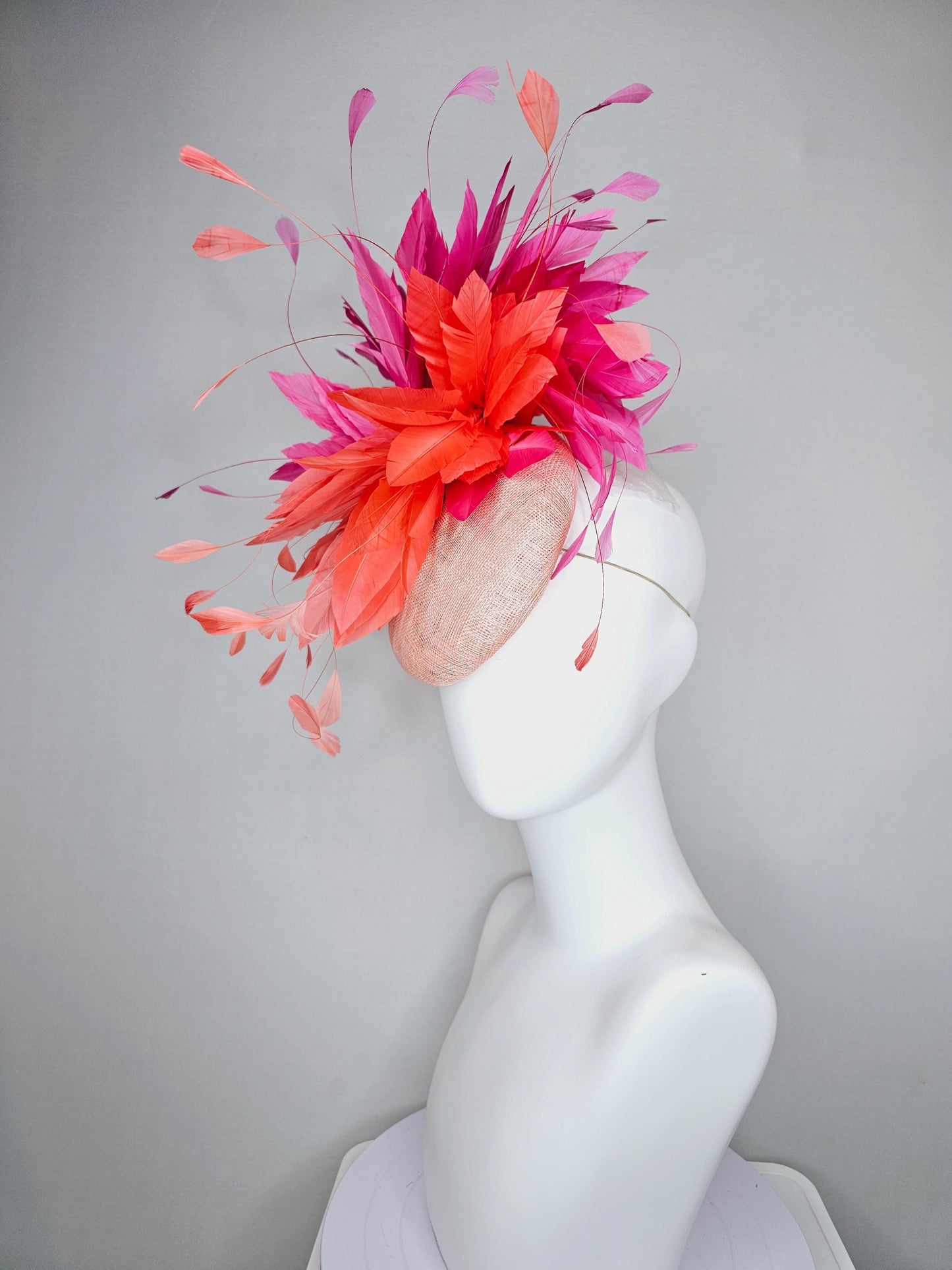 kentucky derby hat fascinator light orange peach sinamay with fluffy coral orange and hot pink branching feathers