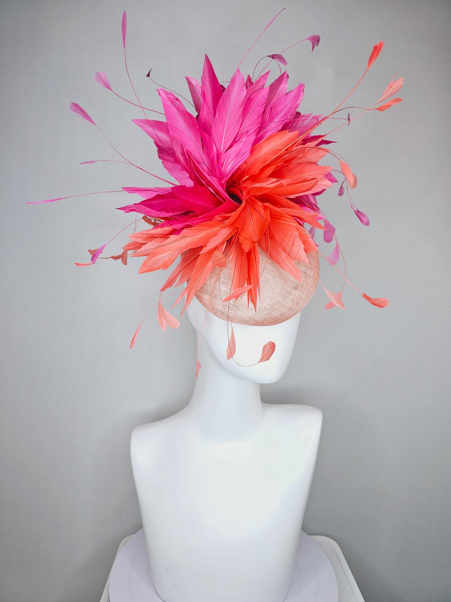 kentucky derby hat fascinator light orange peach sinamay with fluffy coral orange and hot pink branching feathers