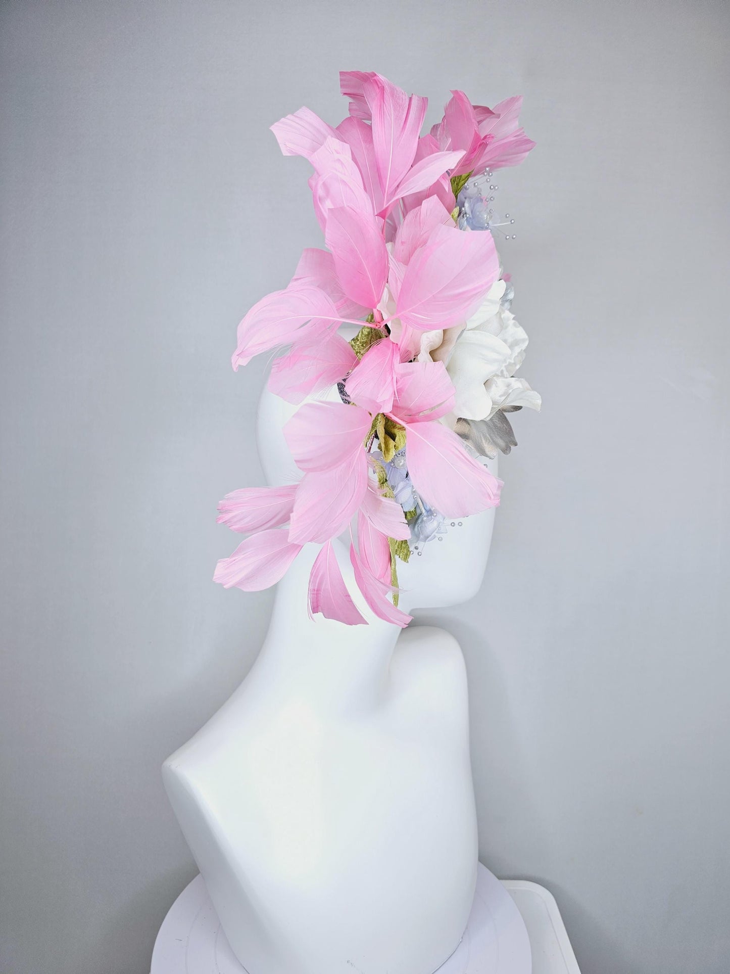 kentucky derby hat fascinator large white silver satin flower, small lavender blue organza satin flowers, green leaves, light pink feathers