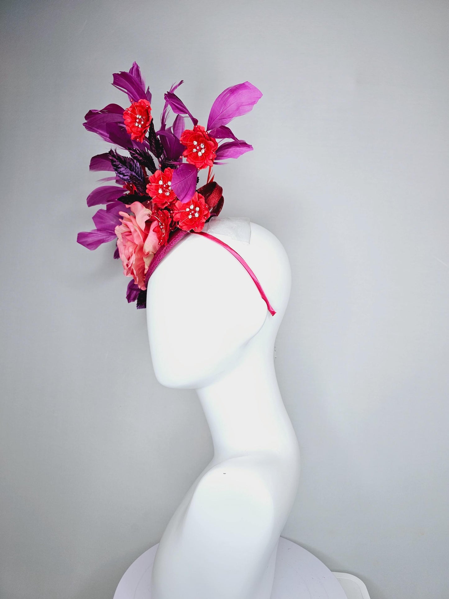 kentucky derby hat fascinator pink ombre satin rose, scarlet red satin flowers, purple leaves, magenta purple branching feathers