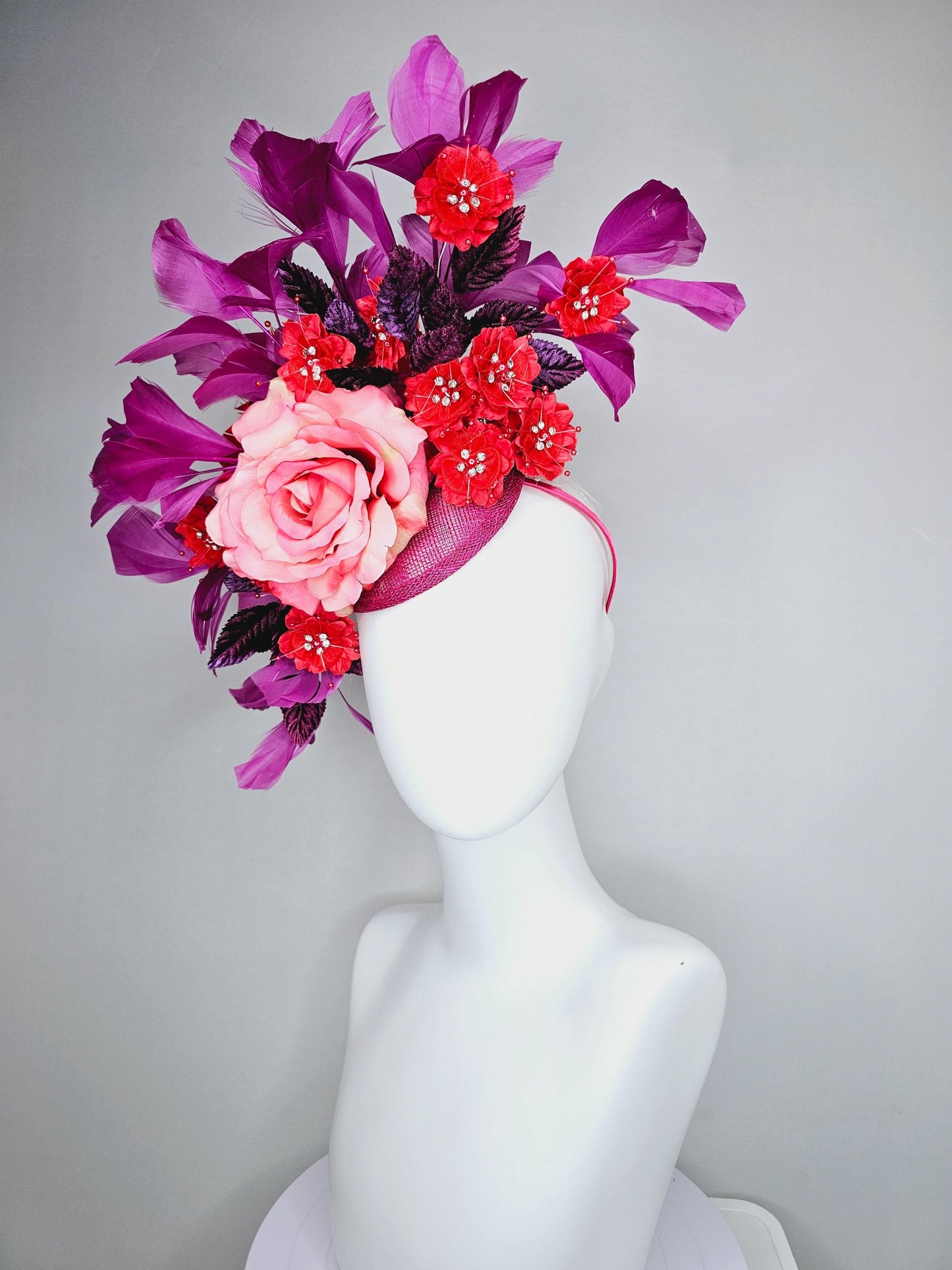 kentucky derby hat fascinator pink ombre satin rose, scarlet red satin flowers, purple leaves, magenta purple branching feathers