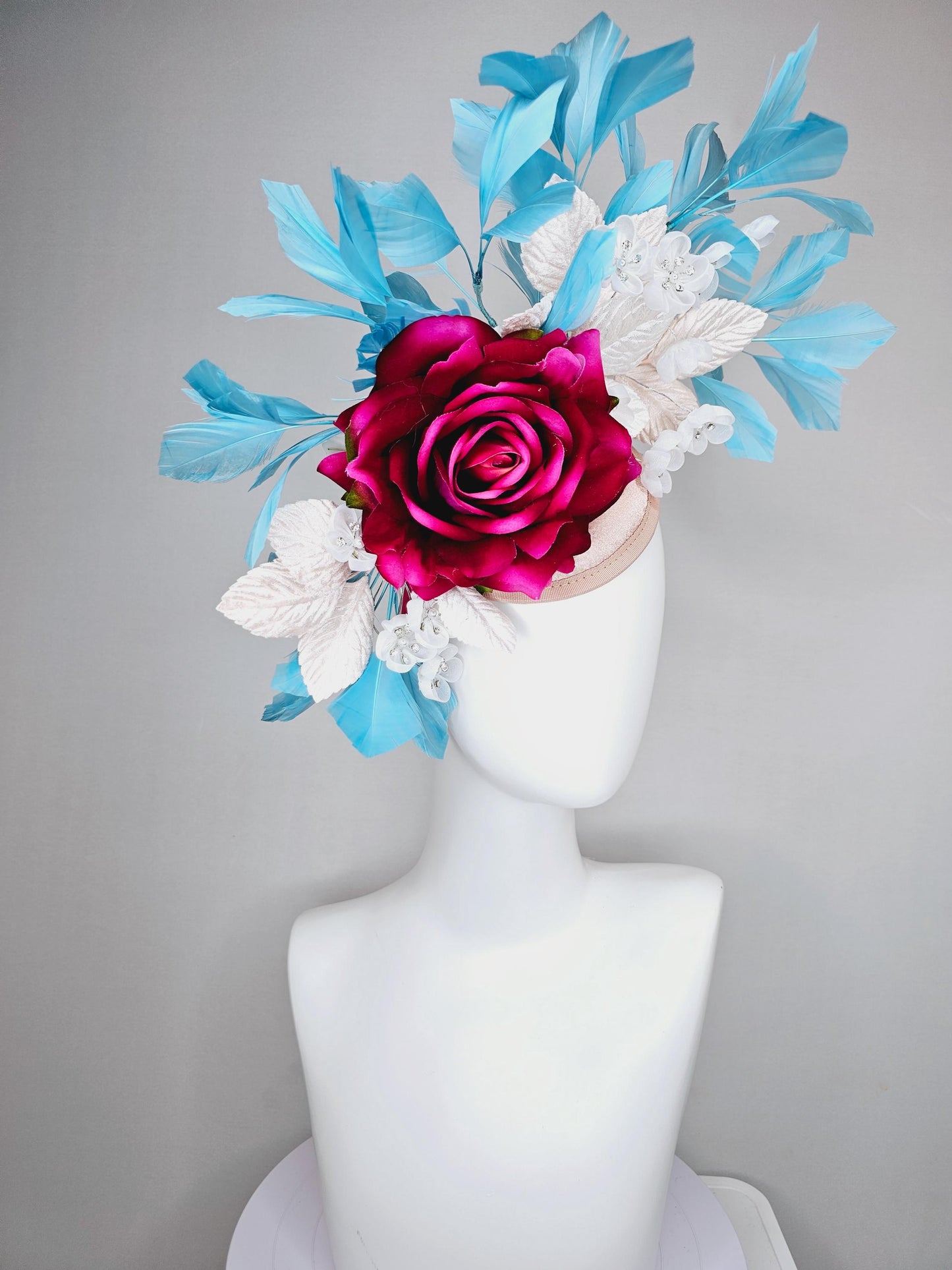 kentucky derby hat fascinator ombre fuchsia pink satin rose,white flowers with crystal pearl center,white leaves,sky blue branching feathers