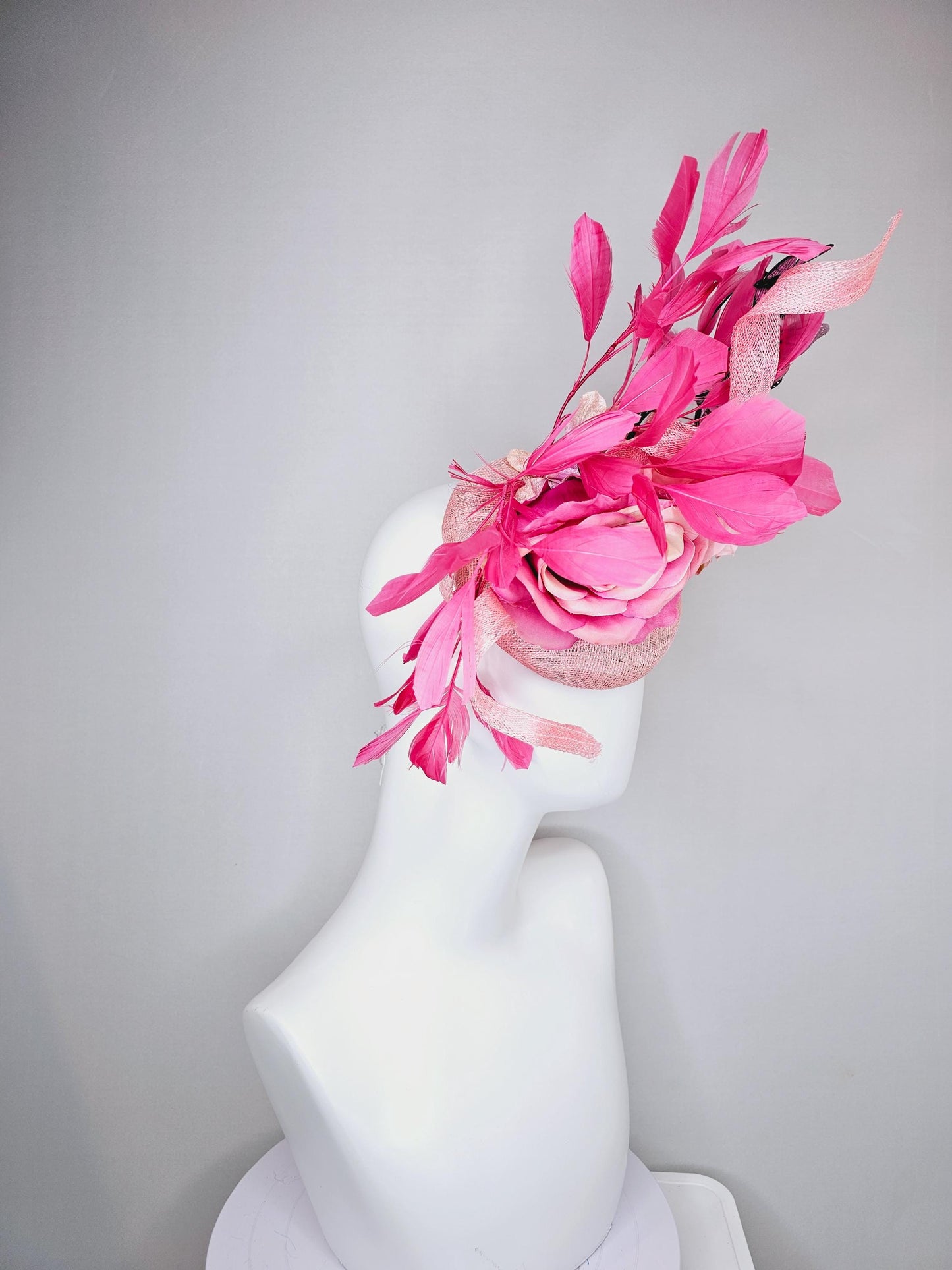 kentucky derby hat fascinator blush pink sinamay with sinamay curls, pink blush pink satin roses, pink feathers, pink and black butterflies