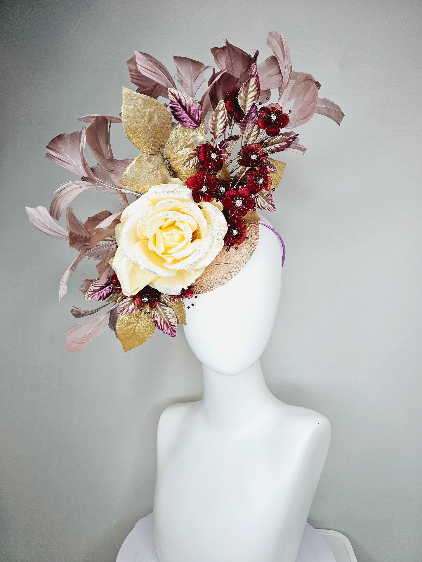 kentucky derby hat fascinator neutral cream satin rose, burgundy red flowers,gold purple ombre leaves,mauve taupe neutral tan beige feathers