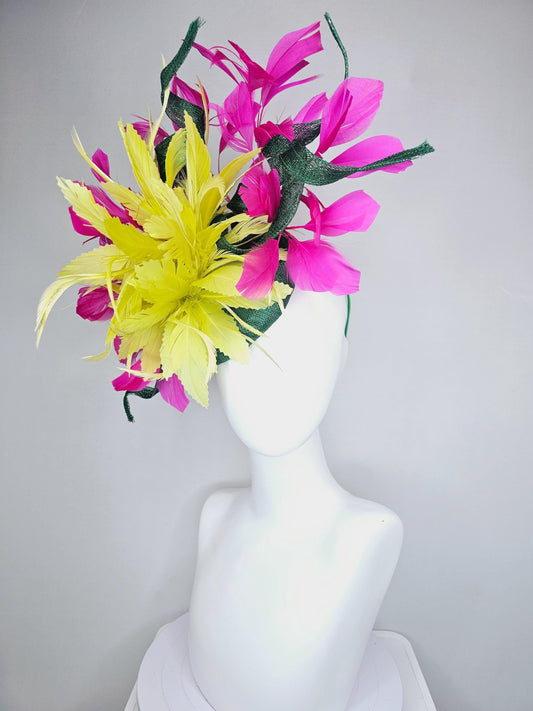 kentucky derby hat fascinator dark green sinamay with curls and fluffy yellow zigzag feather flower, bright pink fuchsia branching feathers