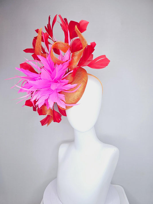 kentucky derby hat fascinator orange sinamay with curls and fluffy zigzag bright pink feather flower, red branching feathers