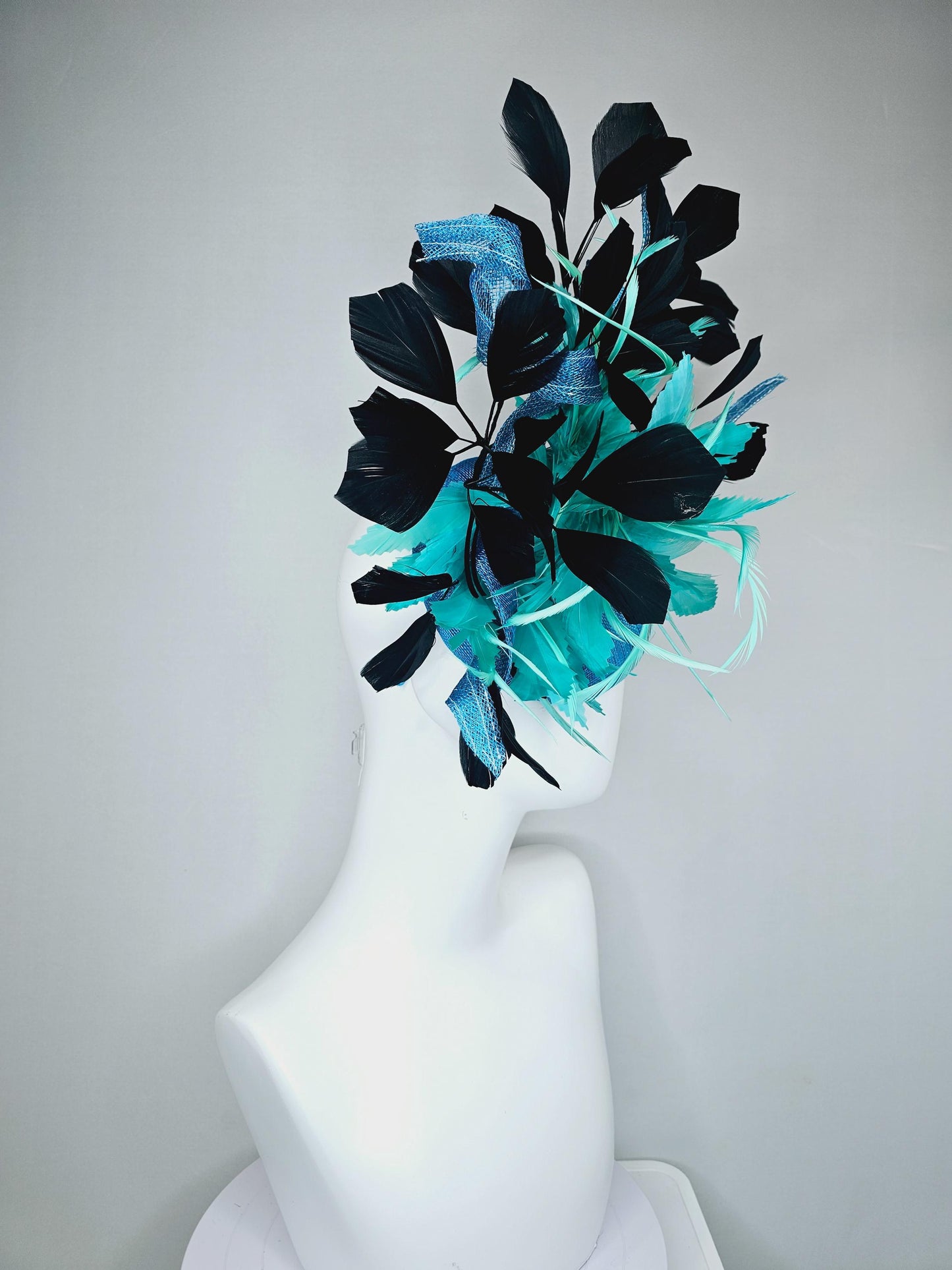 kentucky derby hat fascinator sky blue sinamay with curls, fluffy zigzag turquoise blue mint green feather flower, black branching feathers