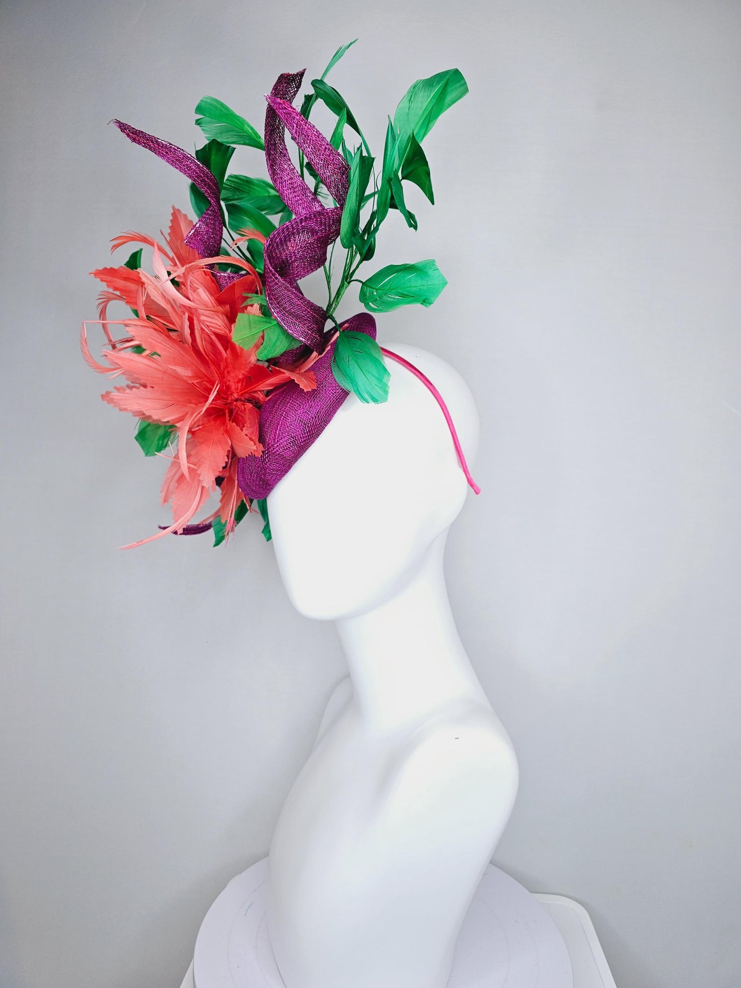 kentucky derby hat fascinator magenta purple sinamay with curls, fluffy zigzag coral orange feather flower, emerald green branching feathers