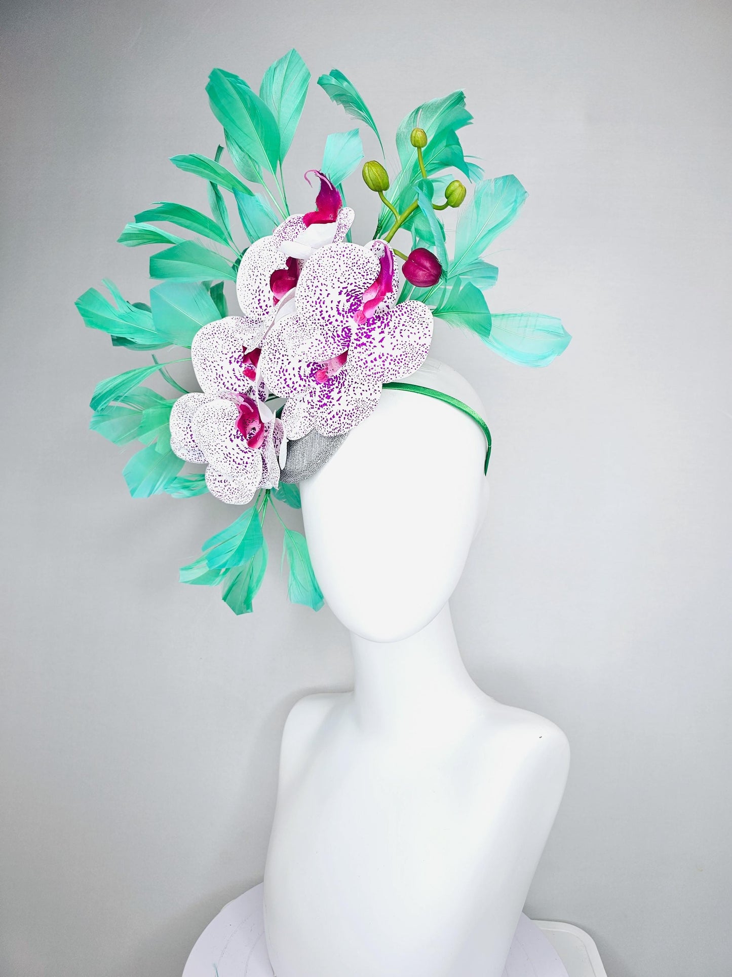 kentucky derby hat fascinator large white and purple satin silk orchid flowers, bright mint green branching feathers