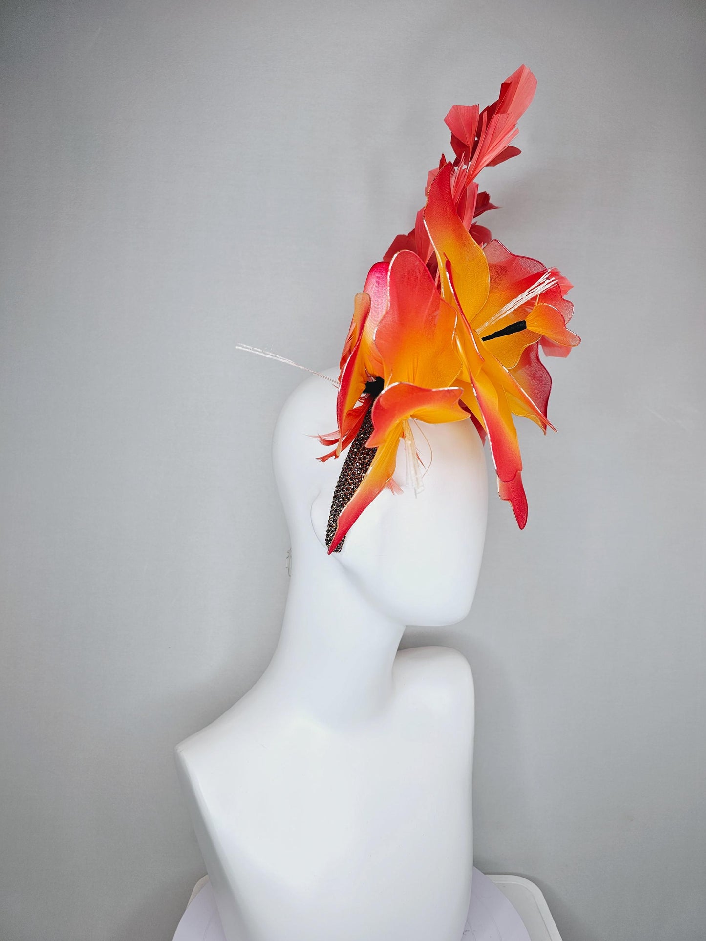 kentucky derby hat fascinator iridescent copper crystal rhinestone headband, large ombre red yellow wire mesh flower, coral orange feathers