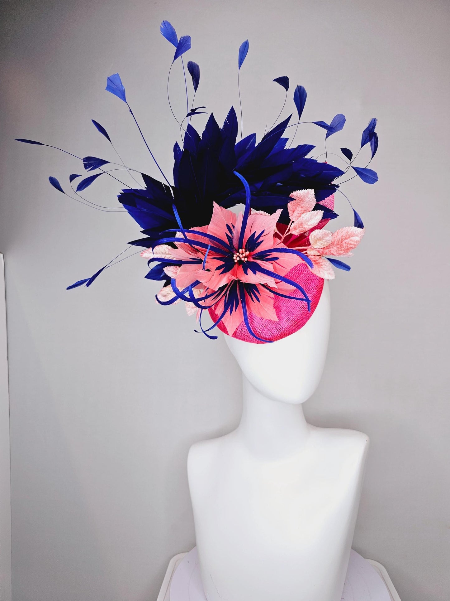 kentucky derby hat fascinator raspberry pink sinamay with peach pink and royal blue feather flower,peach leaves,navy blue branching feathers