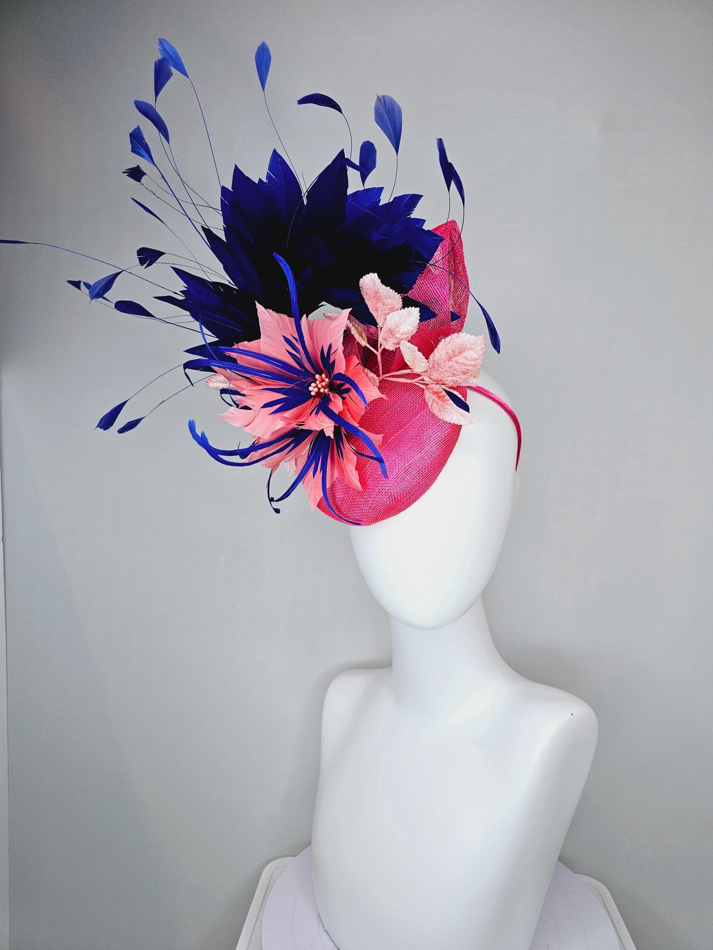 kentucky derby hat fascinator raspberry pink sinamay with peach pink and royal blue feather flower,peach leaves,navy blue branching feathers