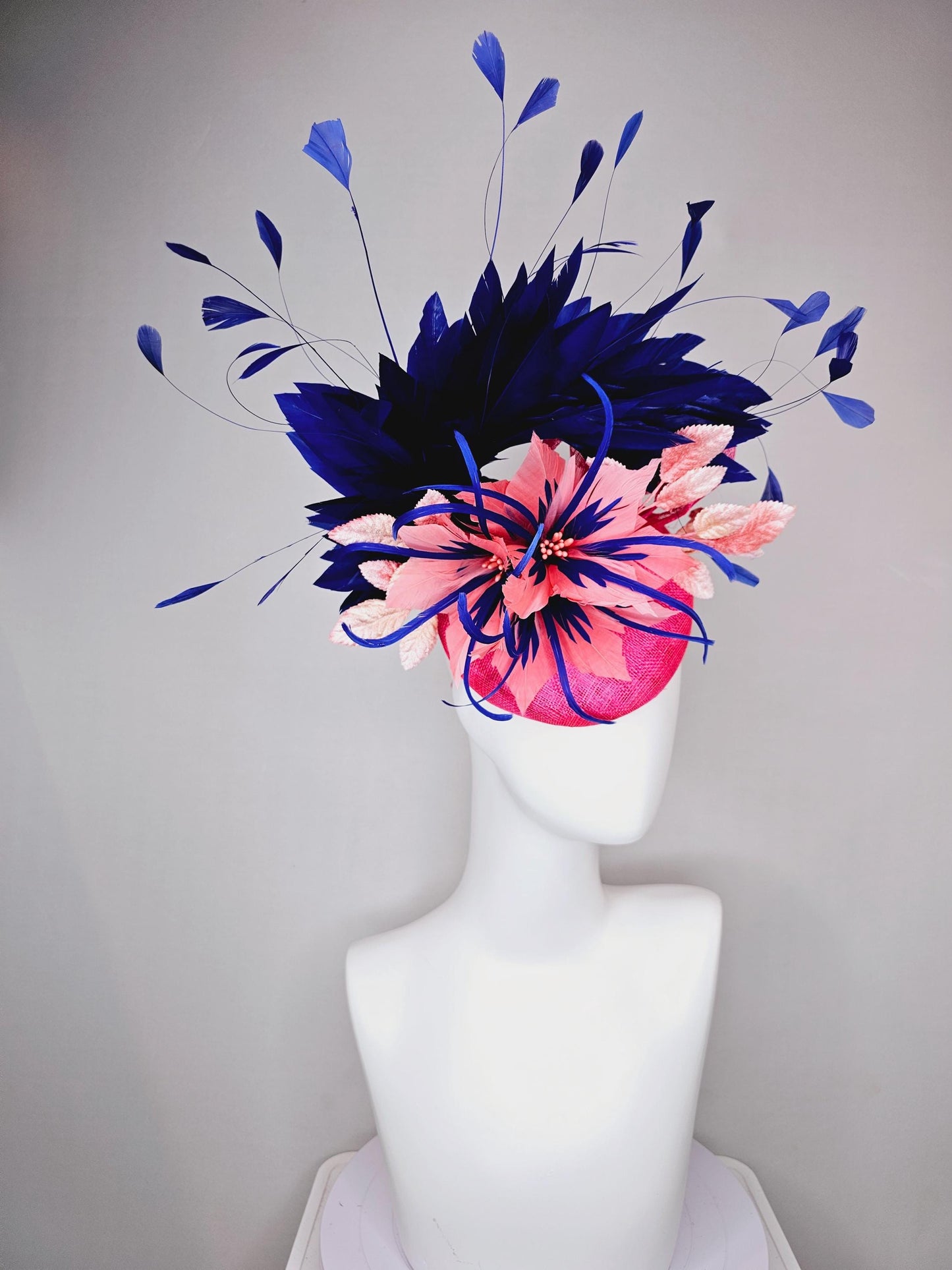 kentucky derby hat fascinator raspberry pink sinamay with peach pink and royal blue feather flower,peach leaves,navy blue branching feathers