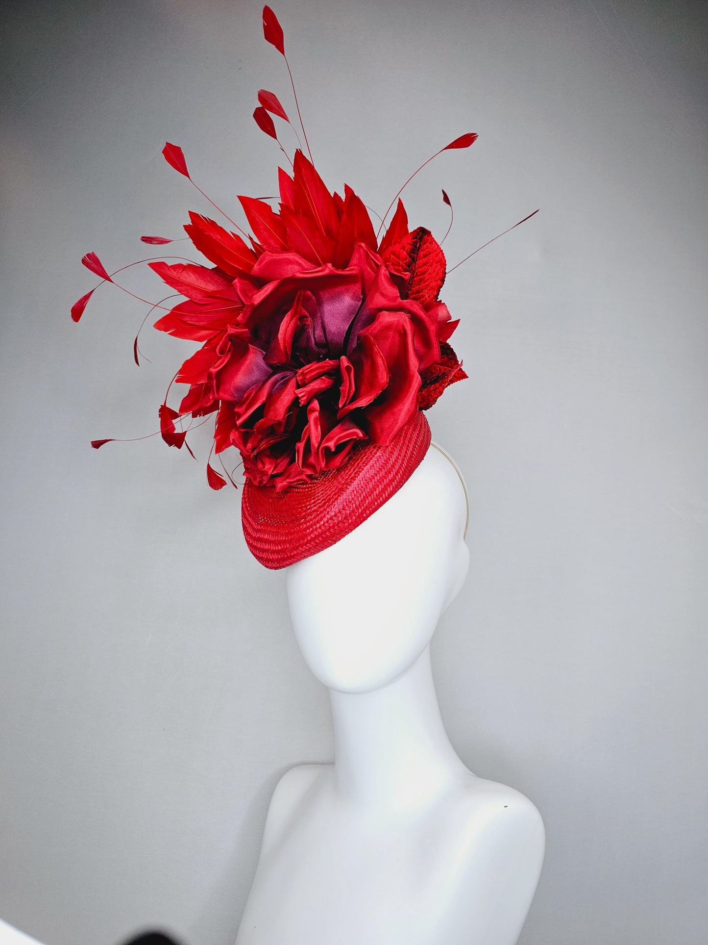 kentucky derby hat fascinator scarlet red woven base,large red purple satin silk rose flower,red leaves and cherry red branching feathers