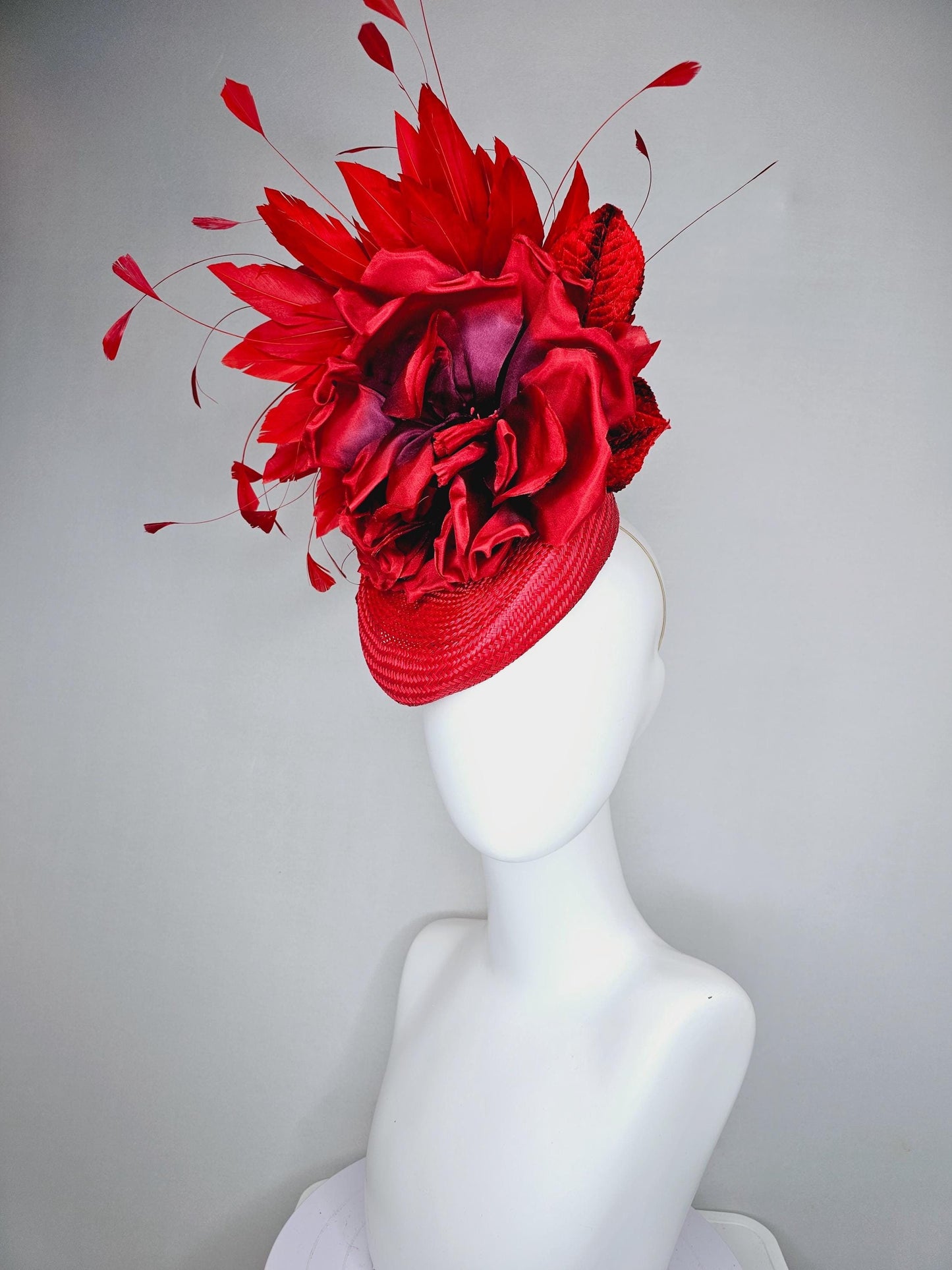 kentucky derby hat fascinator scarlet red woven base,large red purple satin silk rose flower,red leaves and cherry red branching feathers