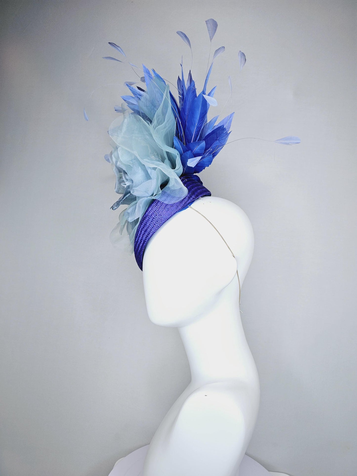 kentucky derby hat fascinator royal blue woven base with large light blue organza satin rose flower and light cobalt blue branching feathers