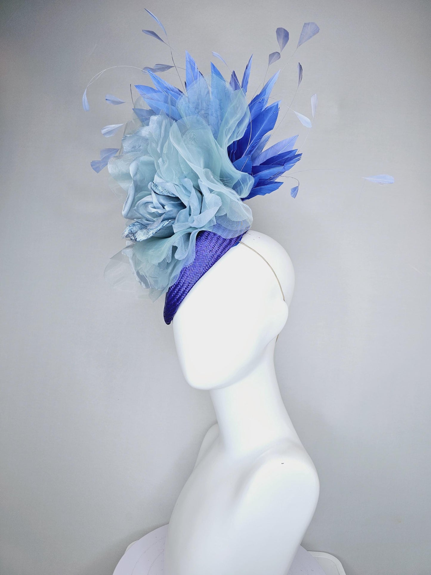 kentucky derby hat fascinator royal blue woven base with large light blue organza satin rose flower and light cobalt blue branching feathers