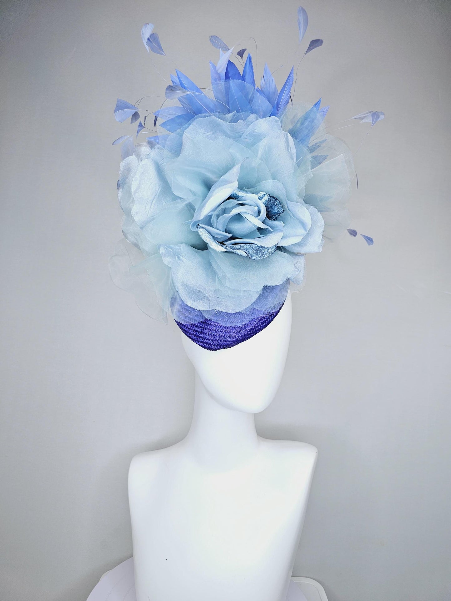 kentucky derby hat fascinator royal blue woven base with large light blue organza satin rose flower and light cobalt blue branching feathers