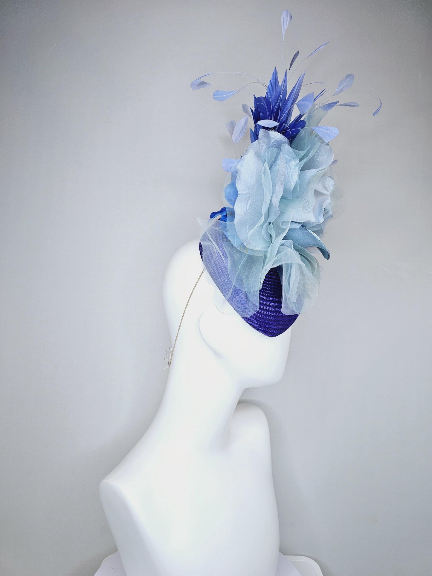 kentucky derby hat fascinator royal blue woven base with large light blue organza satin rose flower and light cobalt blue branching feathers