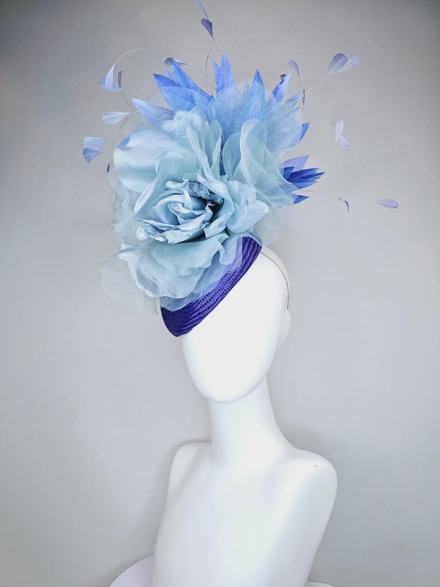 kentucky derby hat fascinator royal blue woven base with large light blue organza satin rose flower and light cobalt blue branching feathers