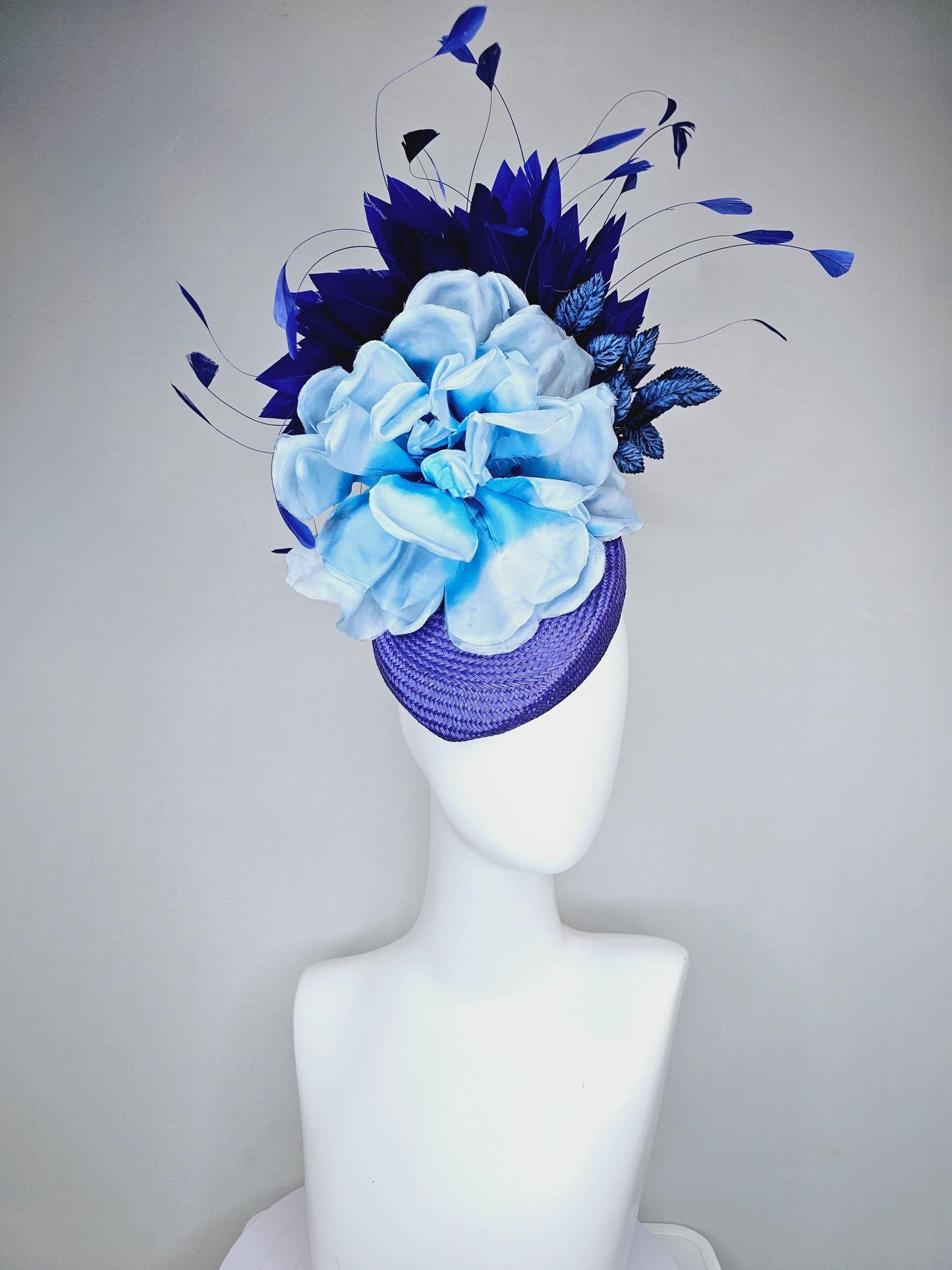 kentucky derby hat fascinator royal blue woven base with large light blue satin silk rose flower and midnight navy blue branching feathers