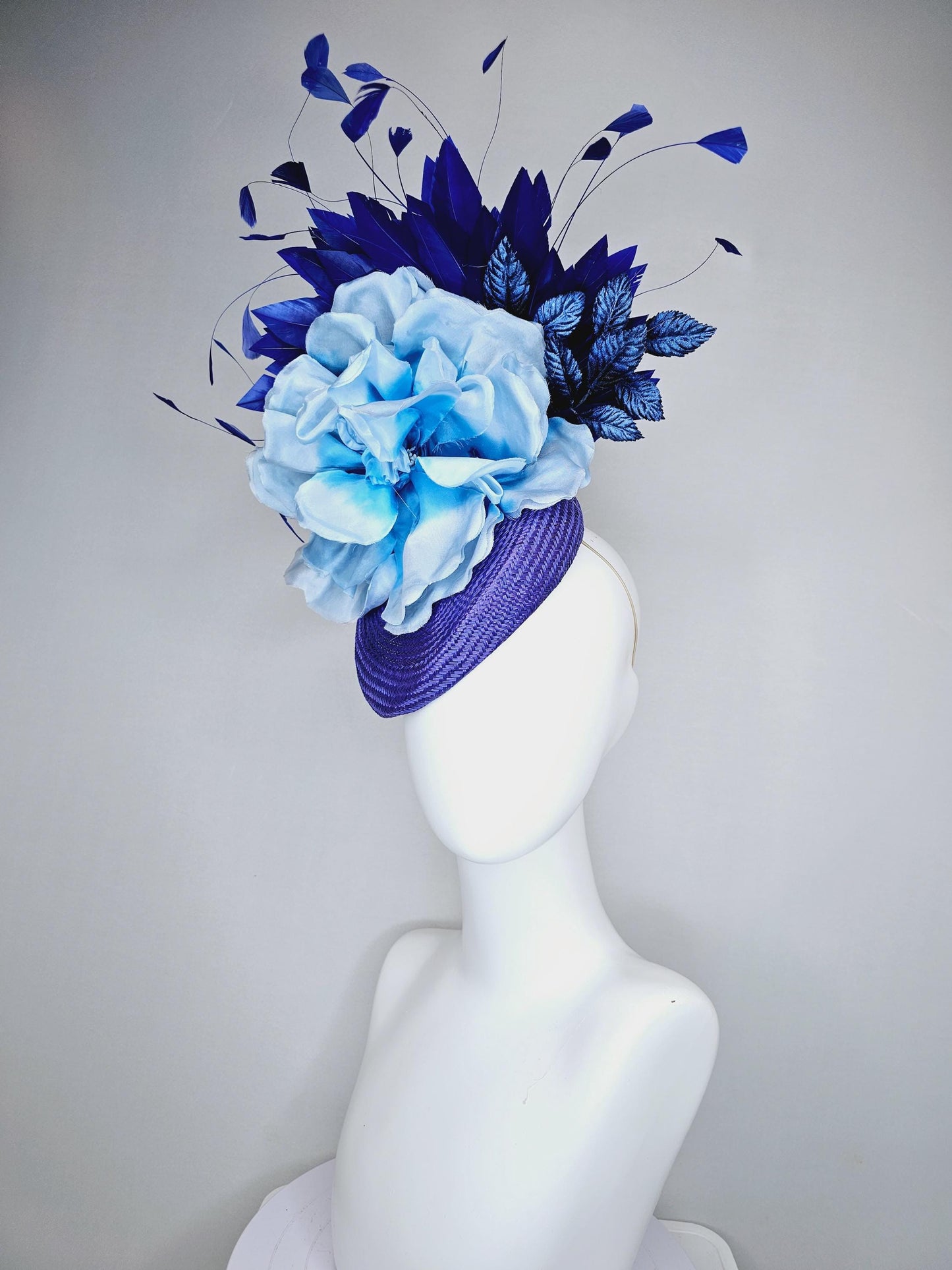 kentucky derby hat fascinator royal blue woven base with large light blue satin silk rose flower and midnight navy blue branching feathers