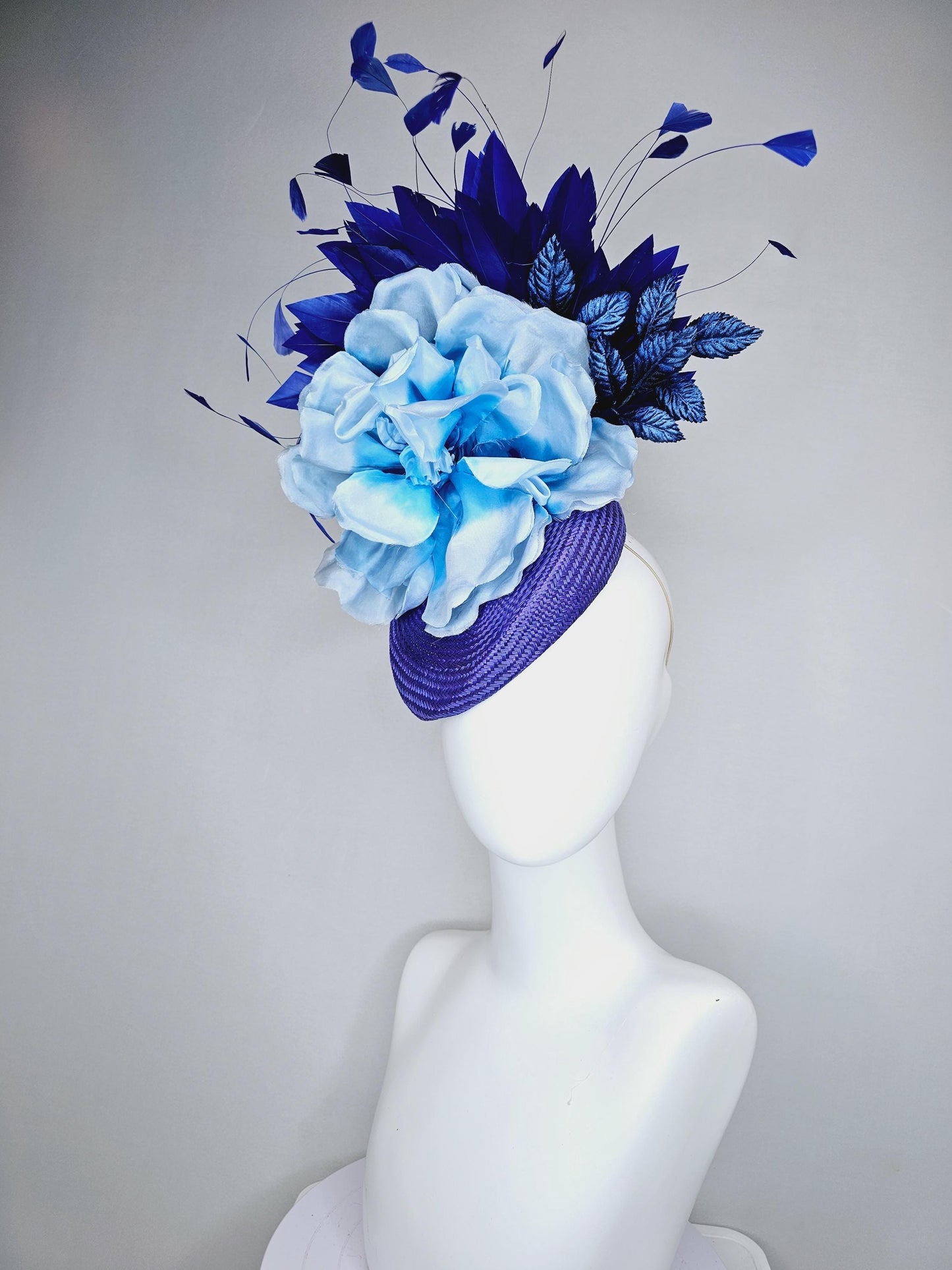 kentucky derby hat fascinator royal blue woven base with large light blue satin silk rose flower and midnight navy blue branching feathers