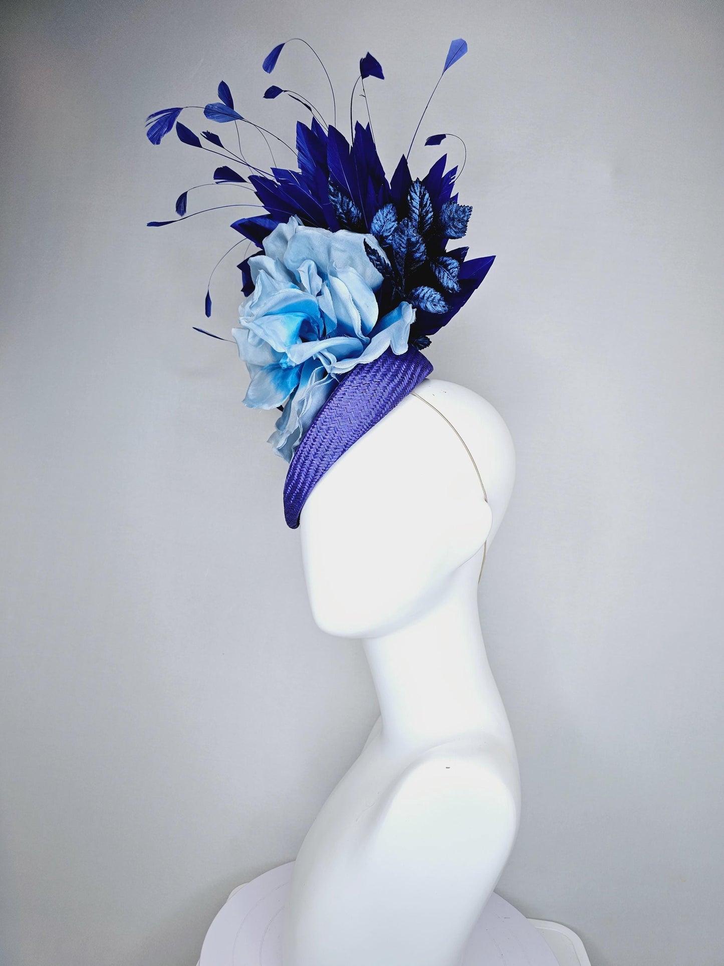 kentucky derby hat fascinator royal blue woven base with large light blue satin silk rose flower and midnight navy blue branching feathers