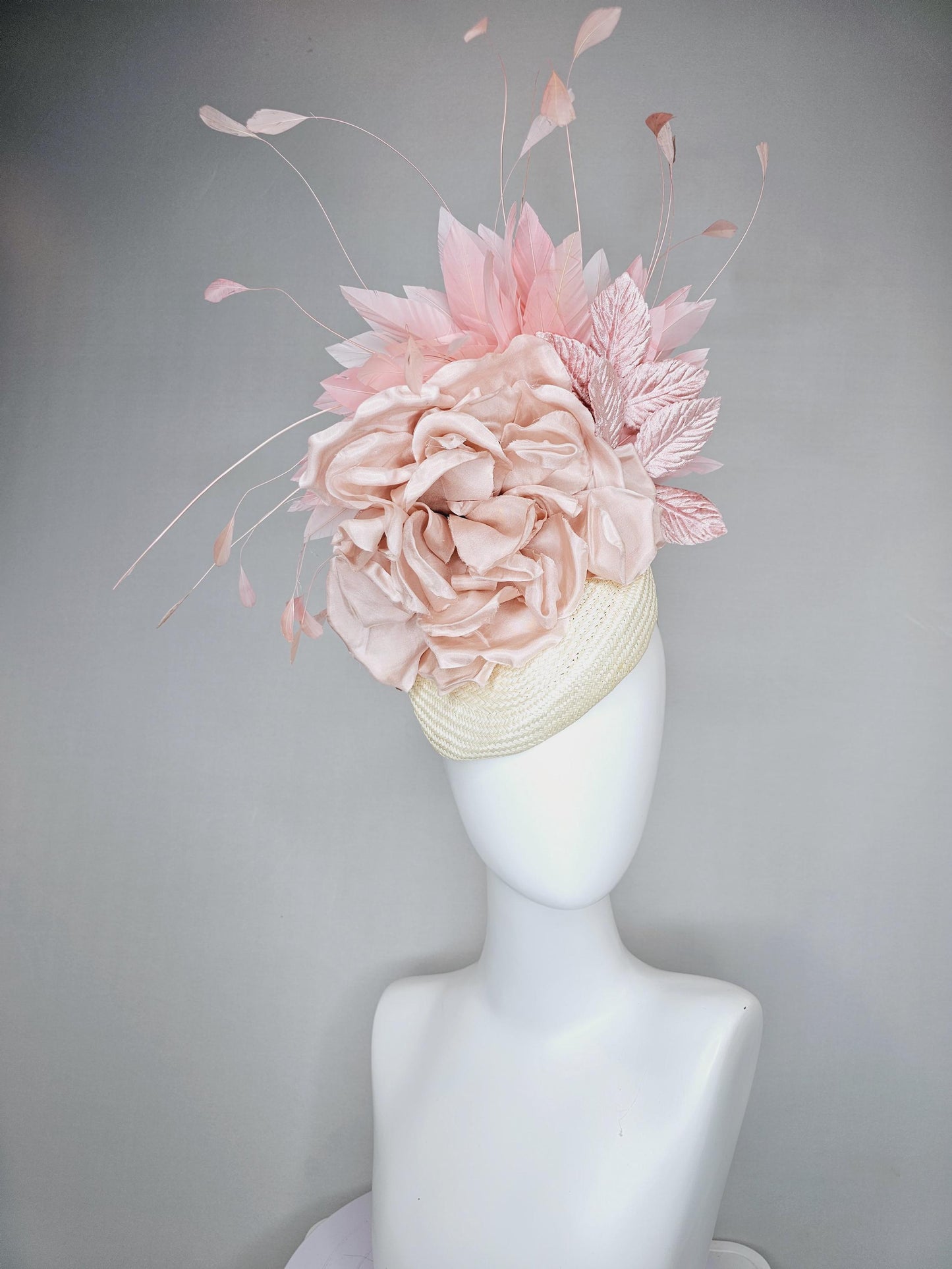 kentucky derby hat fascinator ivory white woven base,dusty pink satin silk rose flower,light pink branching feathers and light pink leaves