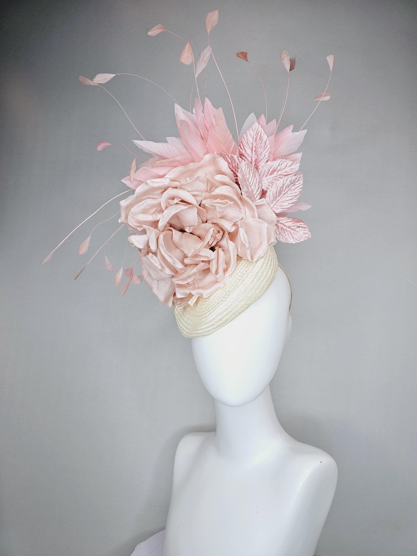 kentucky derby hat fascinator ivory white woven base,dusty pink satin silk rose flower,light pink branching feathers and light pink leaves