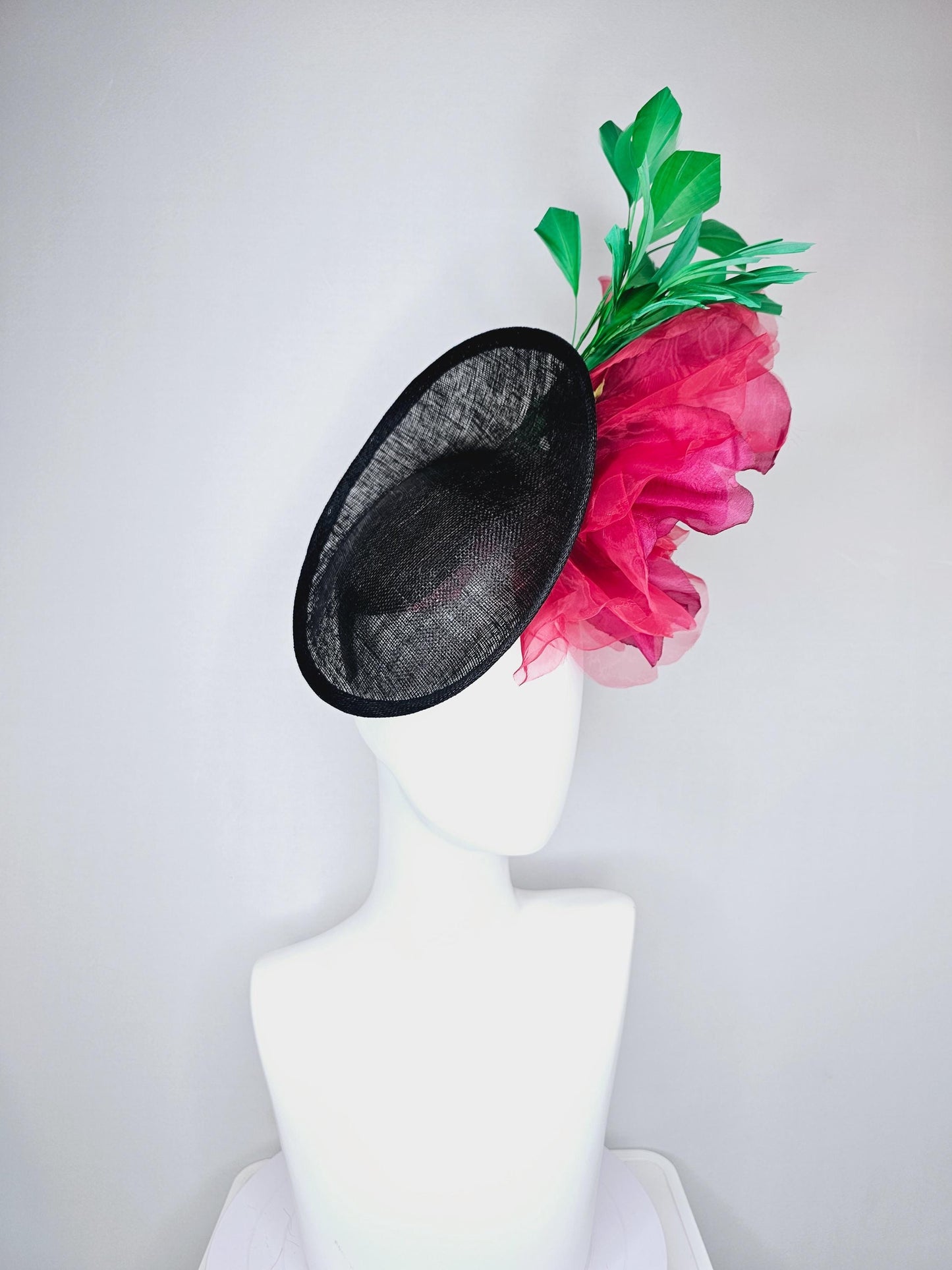 kentucky derby hat fascinator black sinamay saucer with large raspberry pink red organza satin rose and emerald green branching feathers