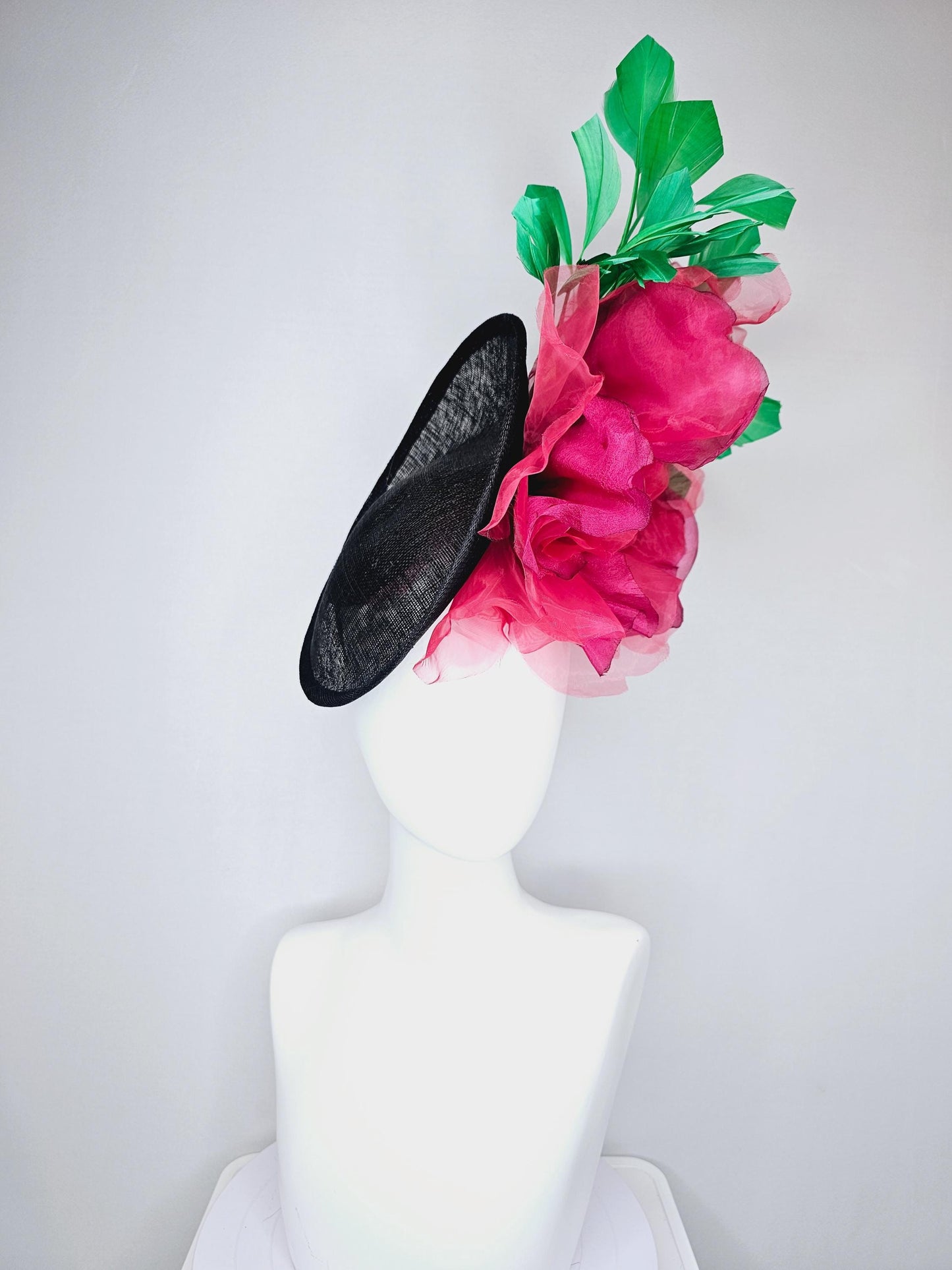 kentucky derby hat fascinator black sinamay saucer with large raspberry pink red organza satin rose and emerald green branching feathers