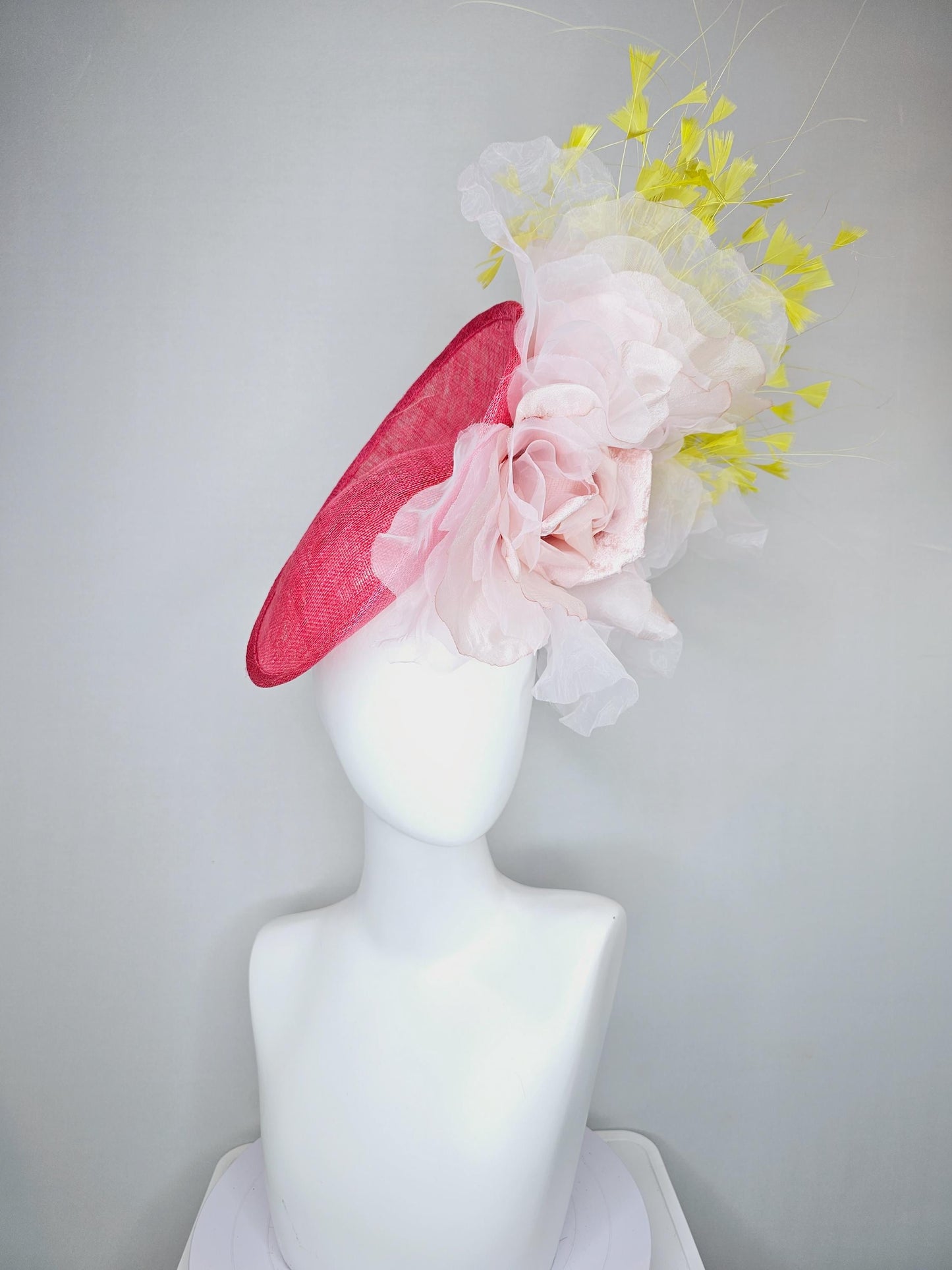 kentucky derby hat fascinator raspberry pink sinamay saucer with large light pale pink organza satin rose and yellow branching feathers