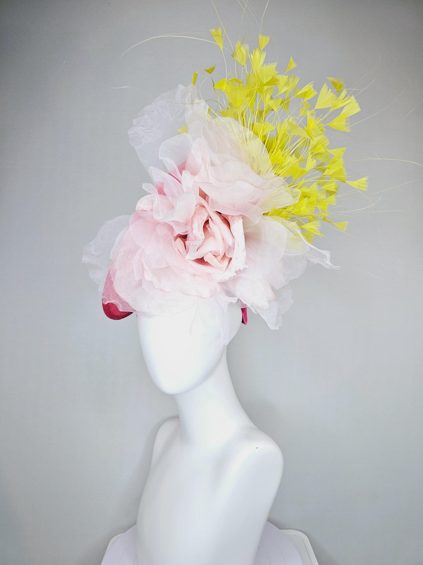 kentucky derby hat fascinator raspberry pink sinamay saucer with large light pale pink organza satin rose and yellow branching feathers