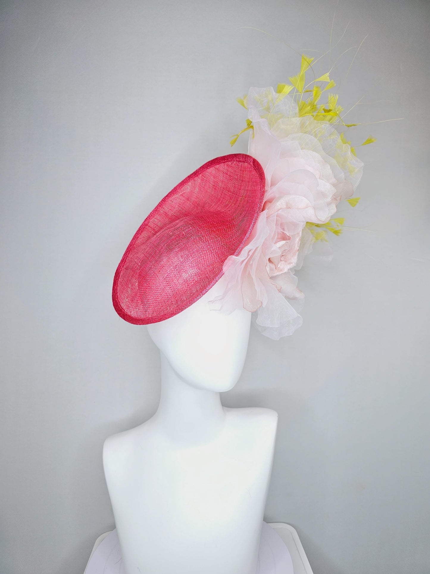 kentucky derby hat fascinator raspberry pink sinamay saucer with large light pale pink organza satin rose and yellow branching feathers