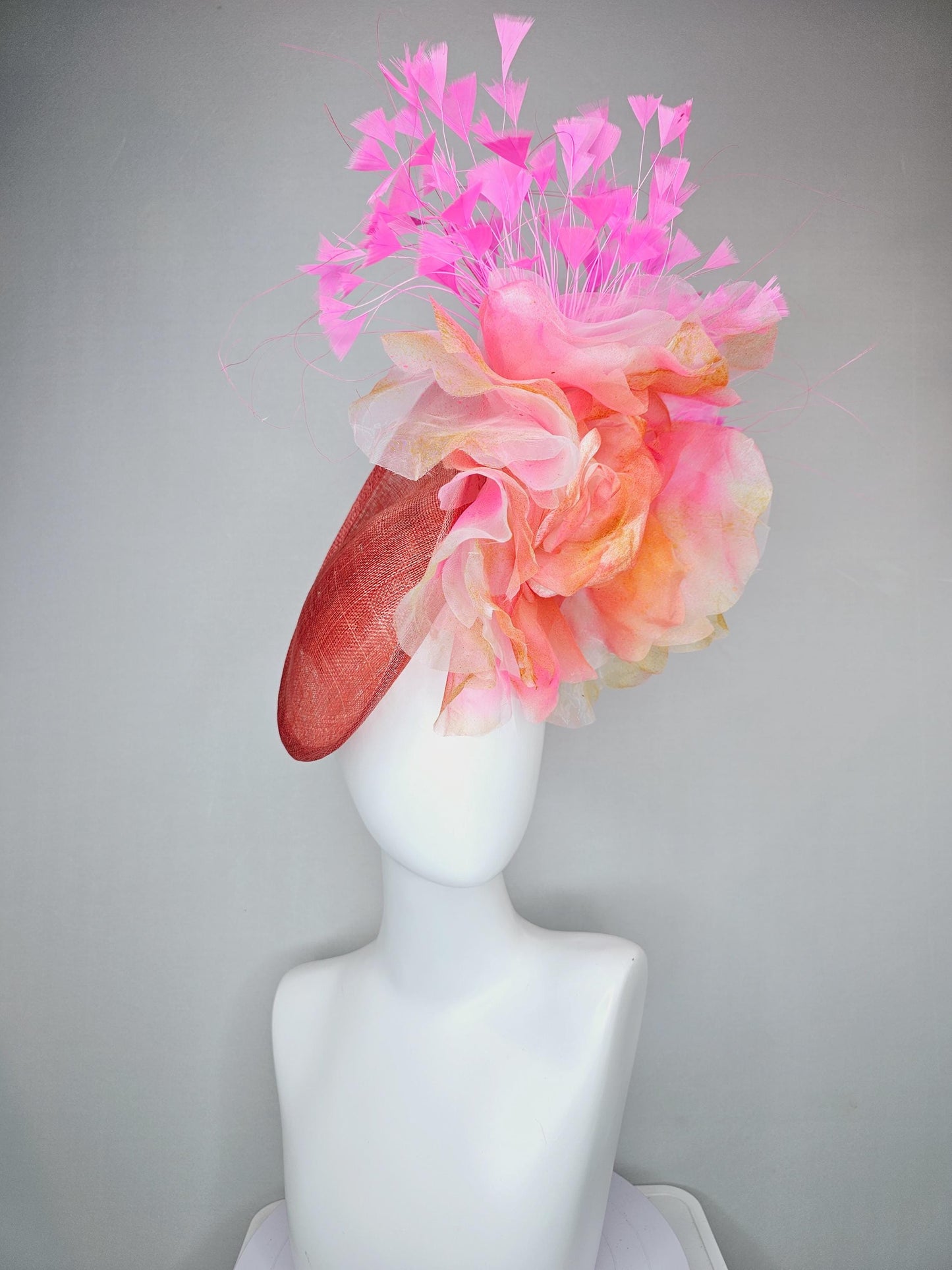 kentucky derby hat fascinator coral orange sinamay saucer with large apricot orange pink tie dye organza satin rose, pink branching feathers